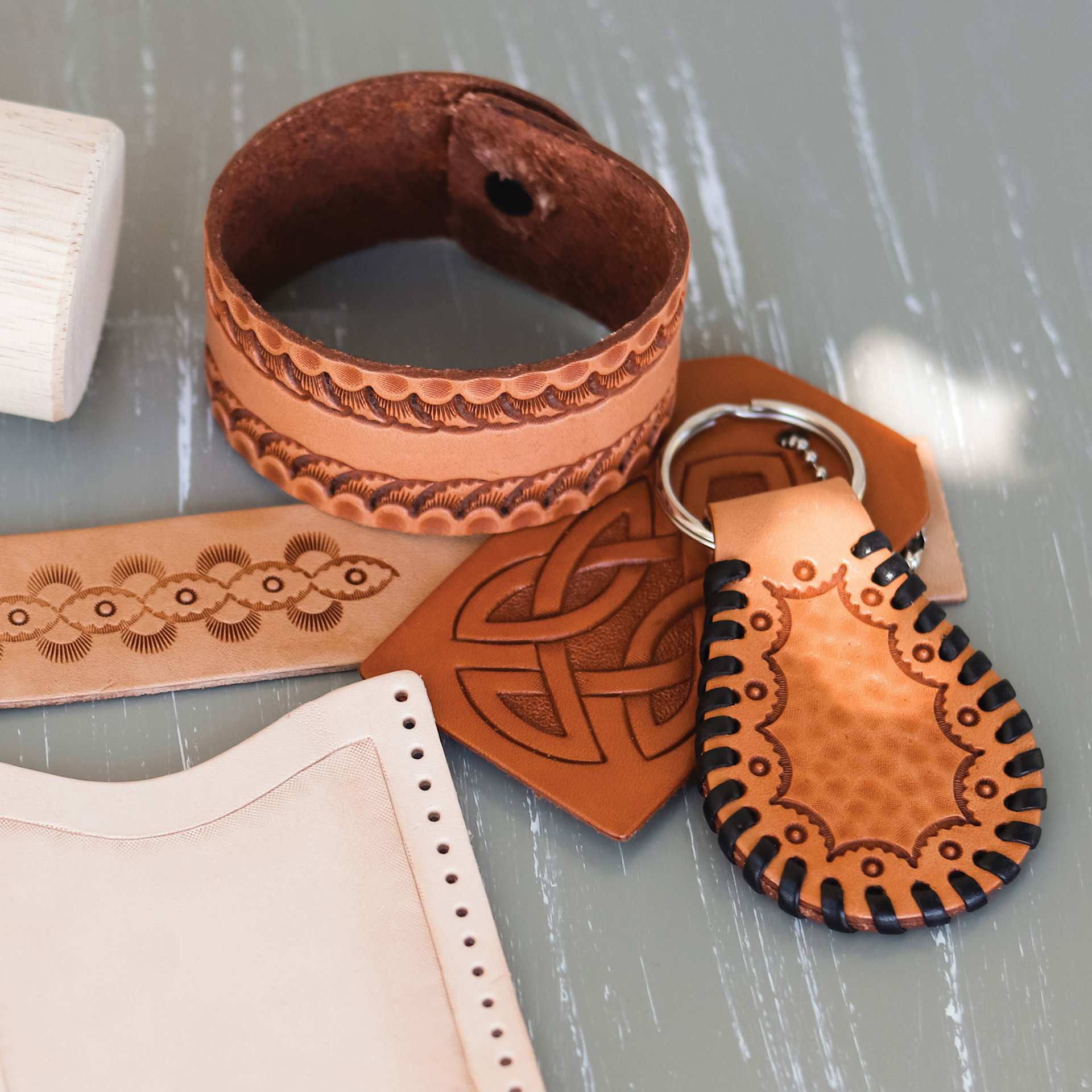 Realeather Explore Leathercraft Kit showing completed projects