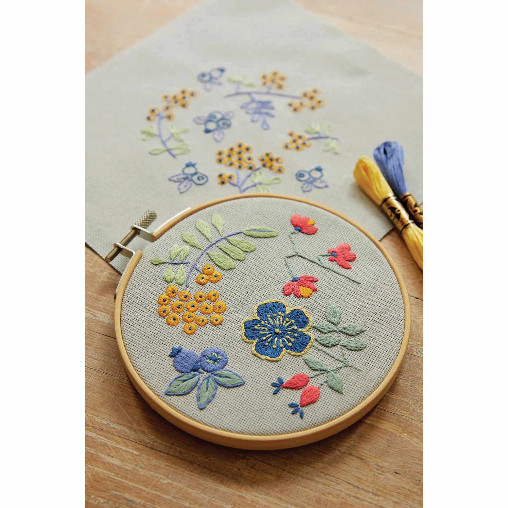 DMC Mindful Making Embroidery Duo Kit - Forest Fruits - finished example and pattern on table