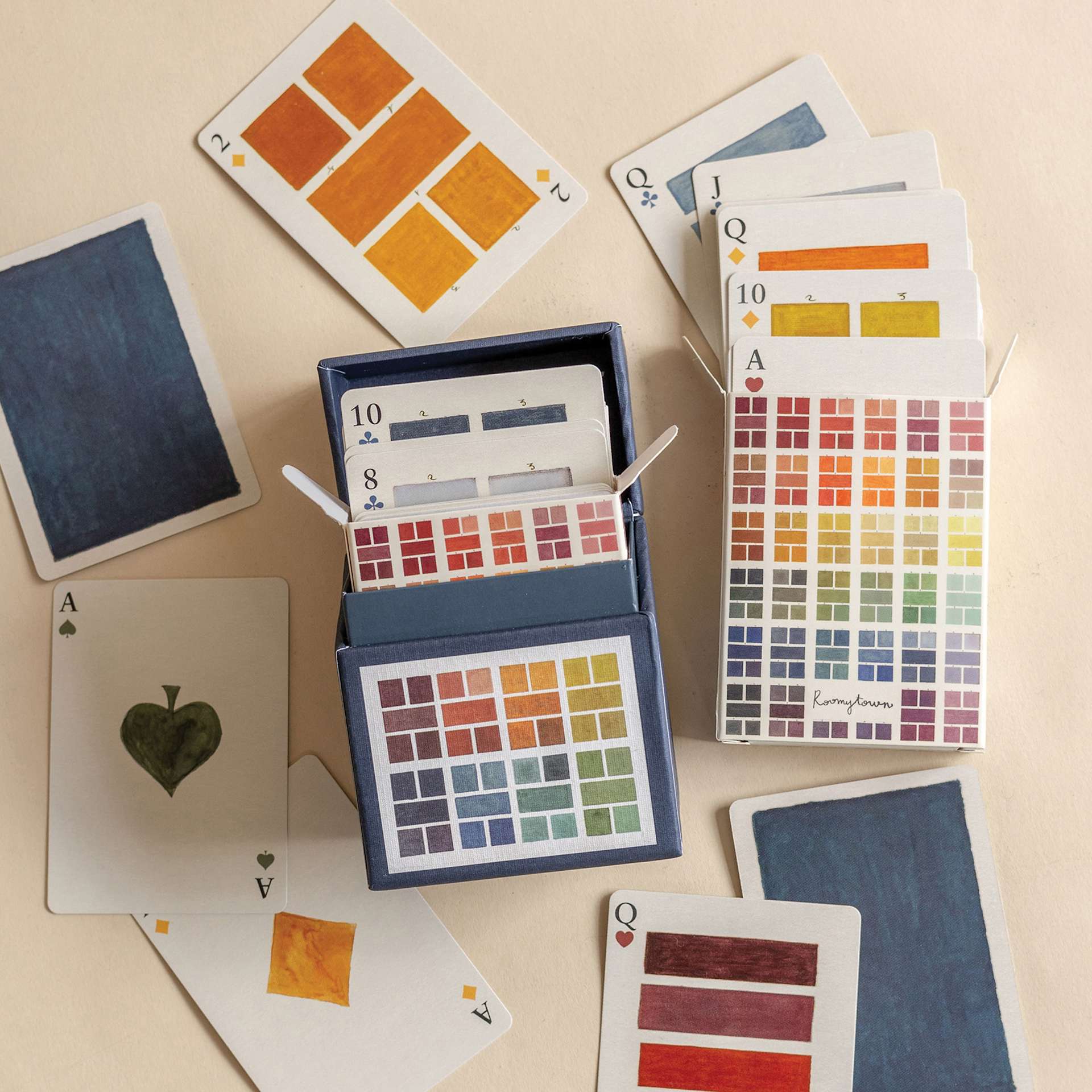 Roomytown Watercolor Swatches Playing Card Set, on table