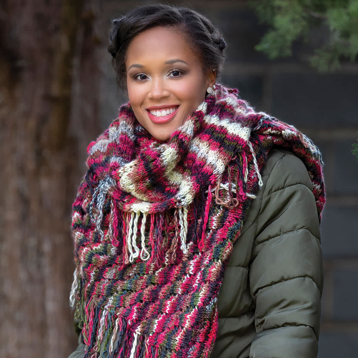 Premier Yarn Spun Colors Yarn - Model wearing large multicolored Knit Scarf