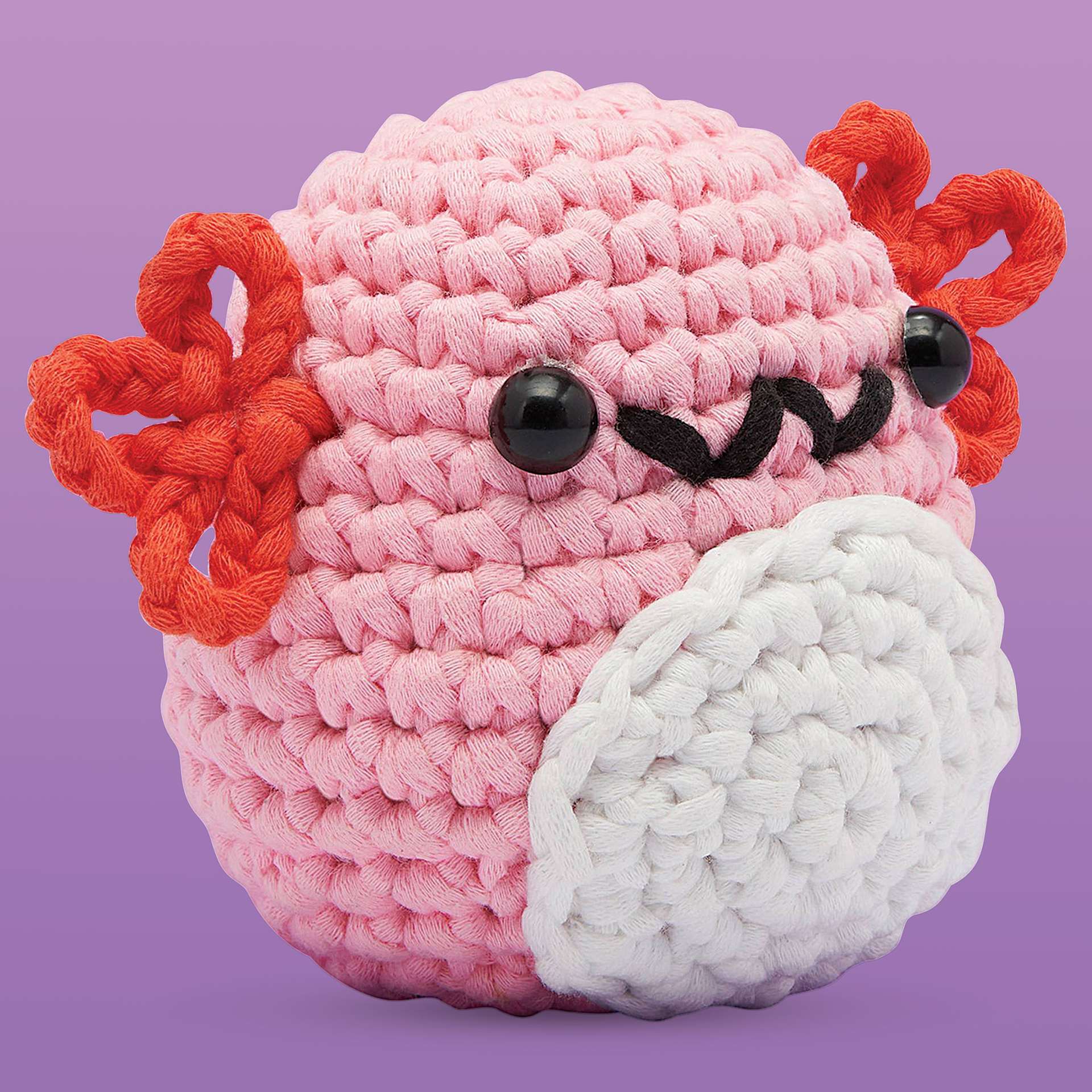 The Woobles Beginner Crochet Amigurumi Kit - Axolotl finished front, angled view