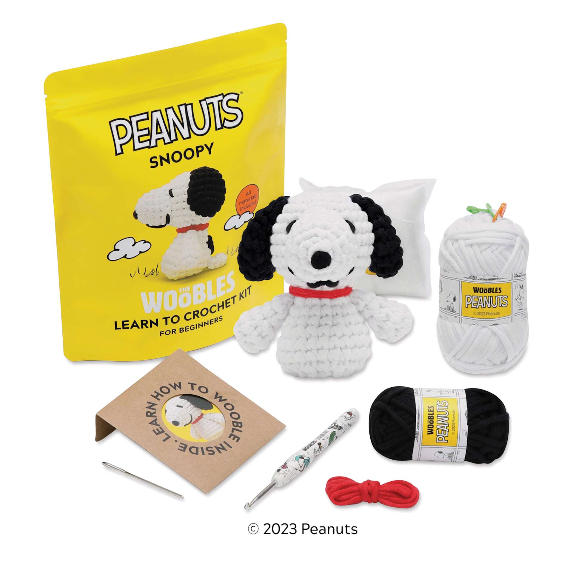 The Woobles Beginner Crochet Amigurumi Kit - Snoopy - contents and finished amigurumi