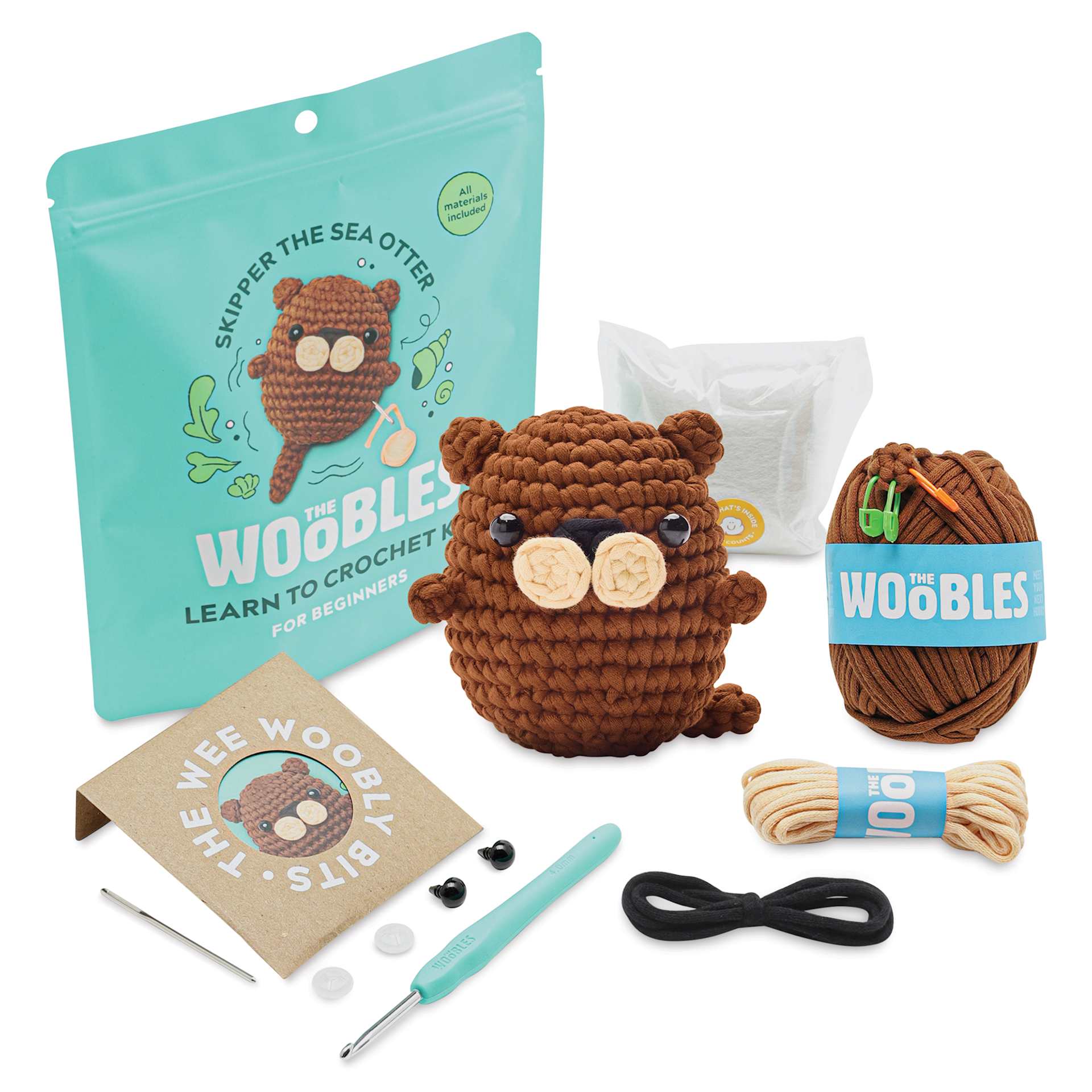 The Woobles Beginner Crochet Amigurumi Kit - finished Sea Otter with kit contents