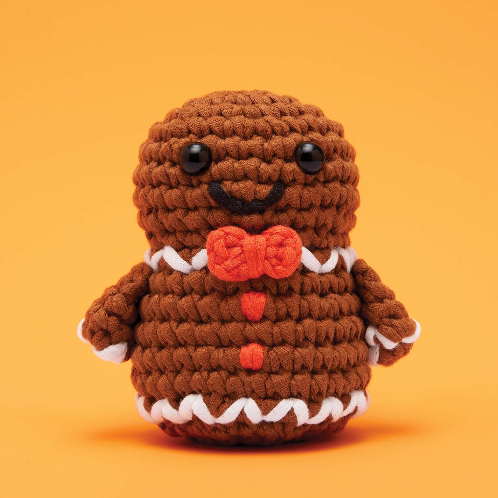 The Woobles Beginner Crochet Amigurumi Kit - Ted the Gingerbread Man, finished example