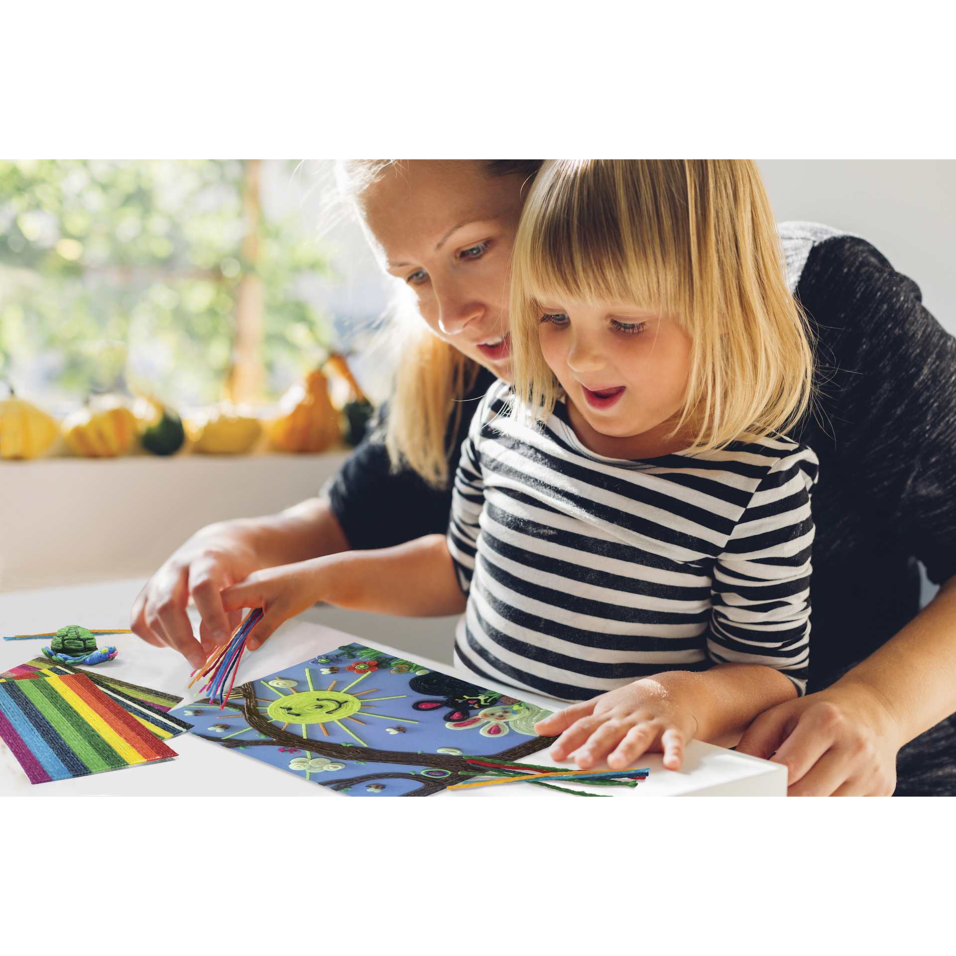 Wikki Stix Take Along Fun Travel Kit - in use by adult and child