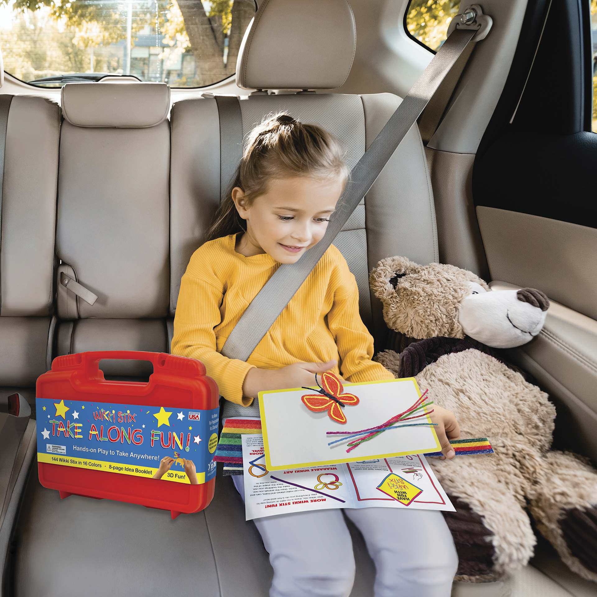 Wikki Stix Take Along Fun Travel Kit - in use by child in backseat of car