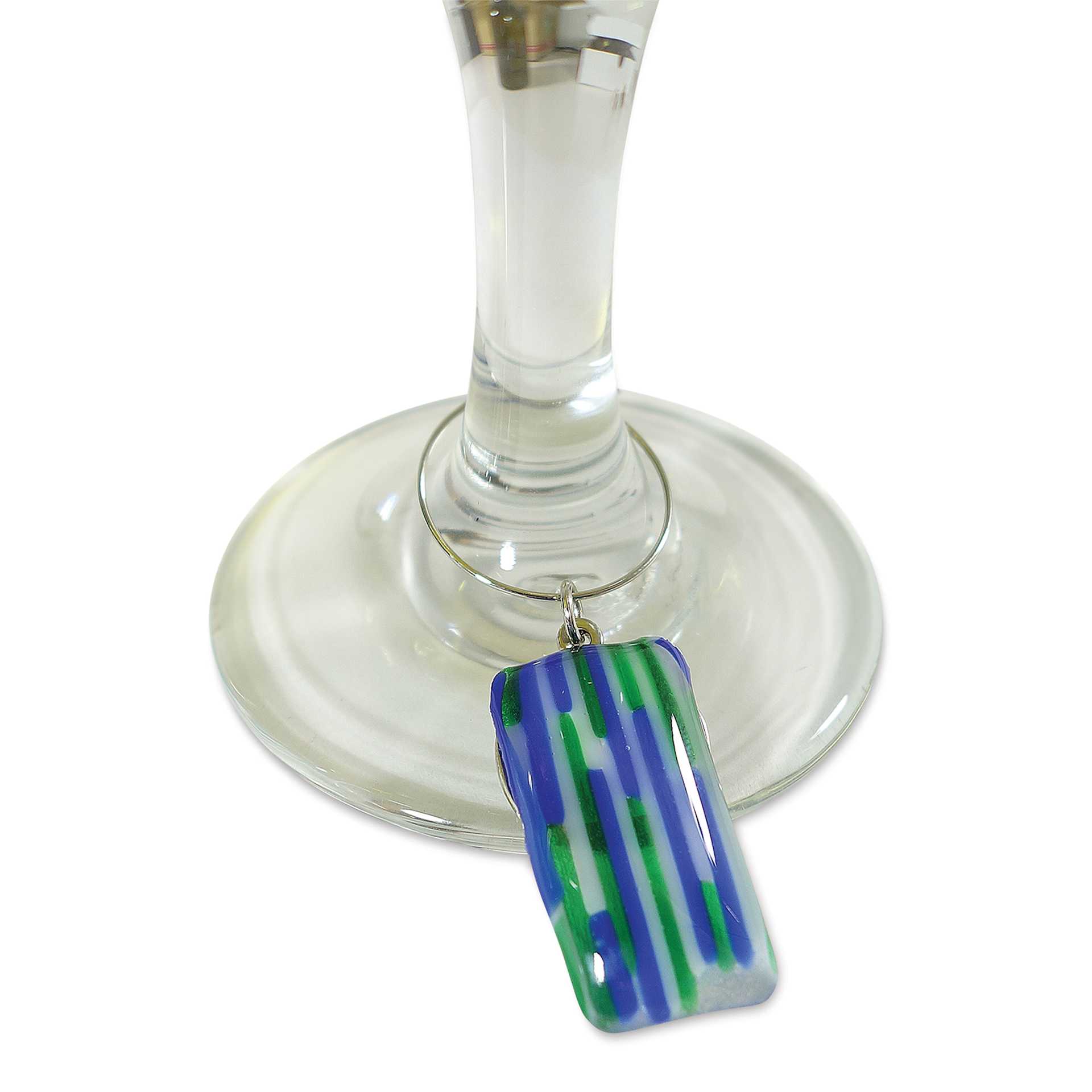 Fuseworks Microwave Glass Kiln - finished glass charm shown on drinking glass stem