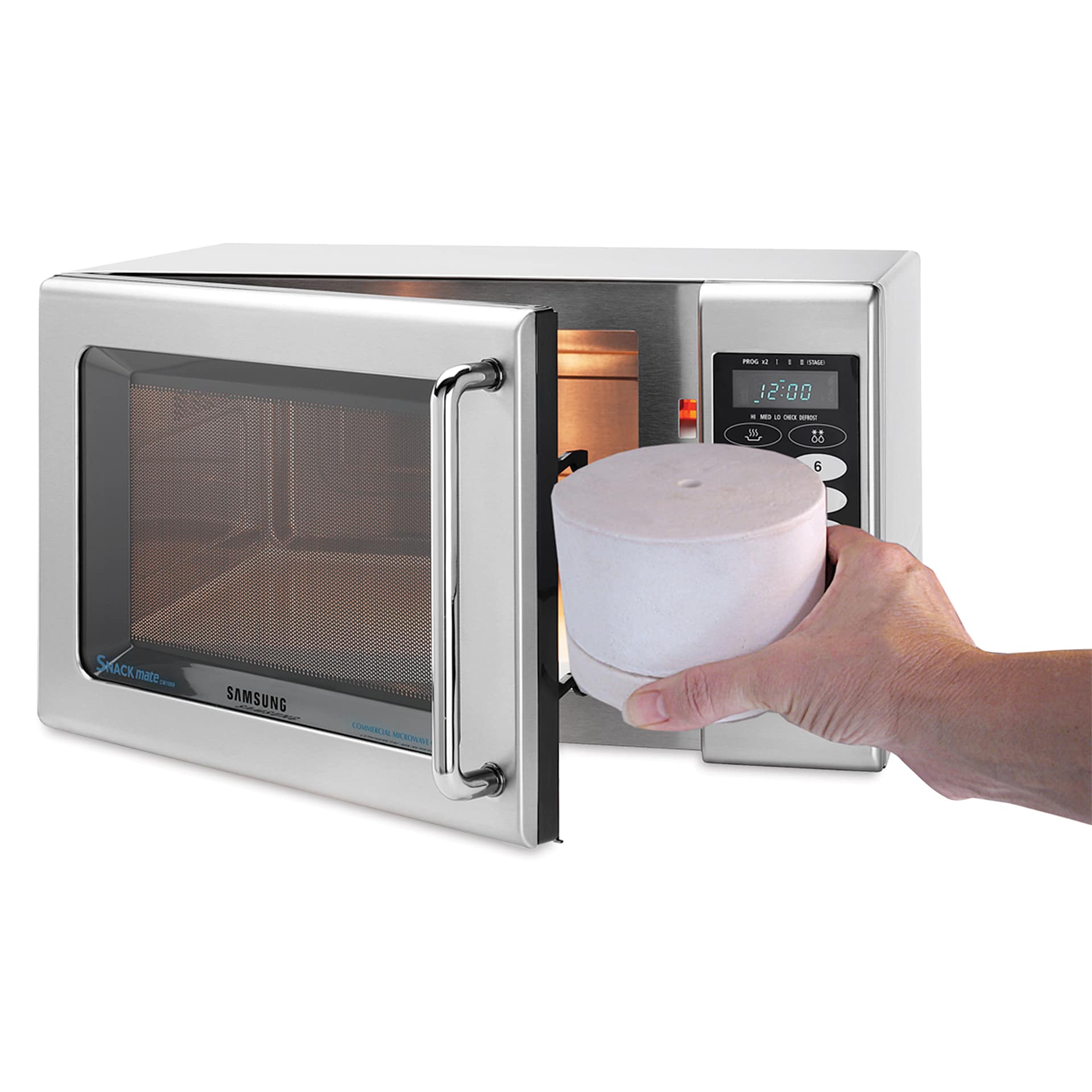 Fuseworks Microwave Glass Kiln being placed in microwave