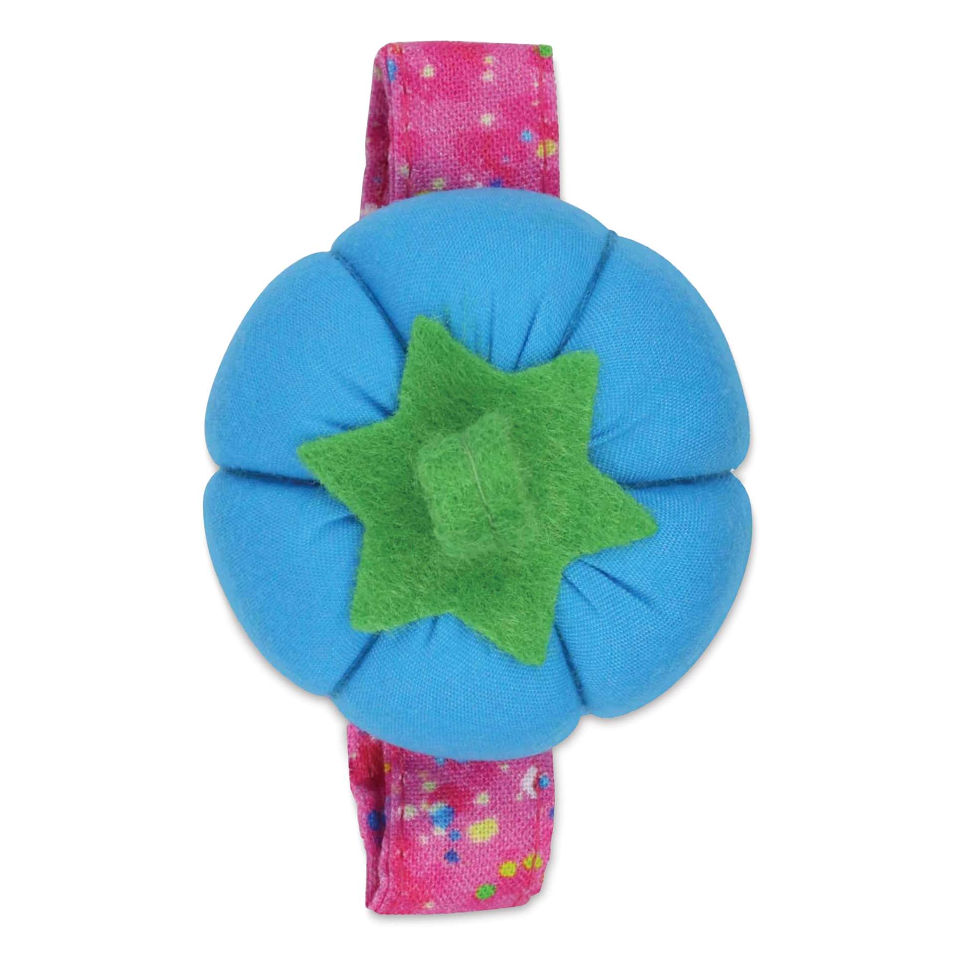 Dritz Tomato Wrist Pin Cushion - Blue out of packaging, close-up