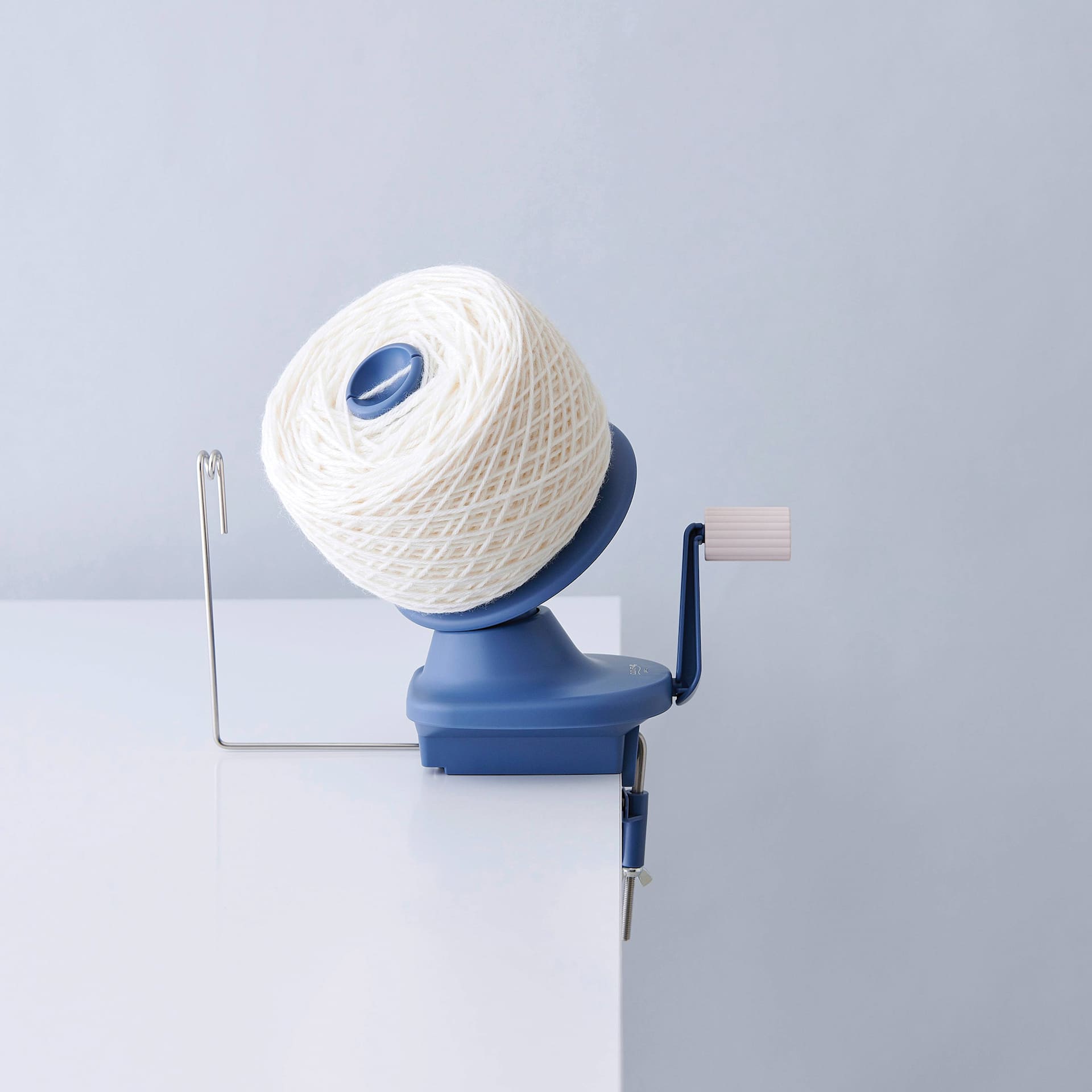 Clover Yarn Ball Winder - clamped to table with complete yarn spool