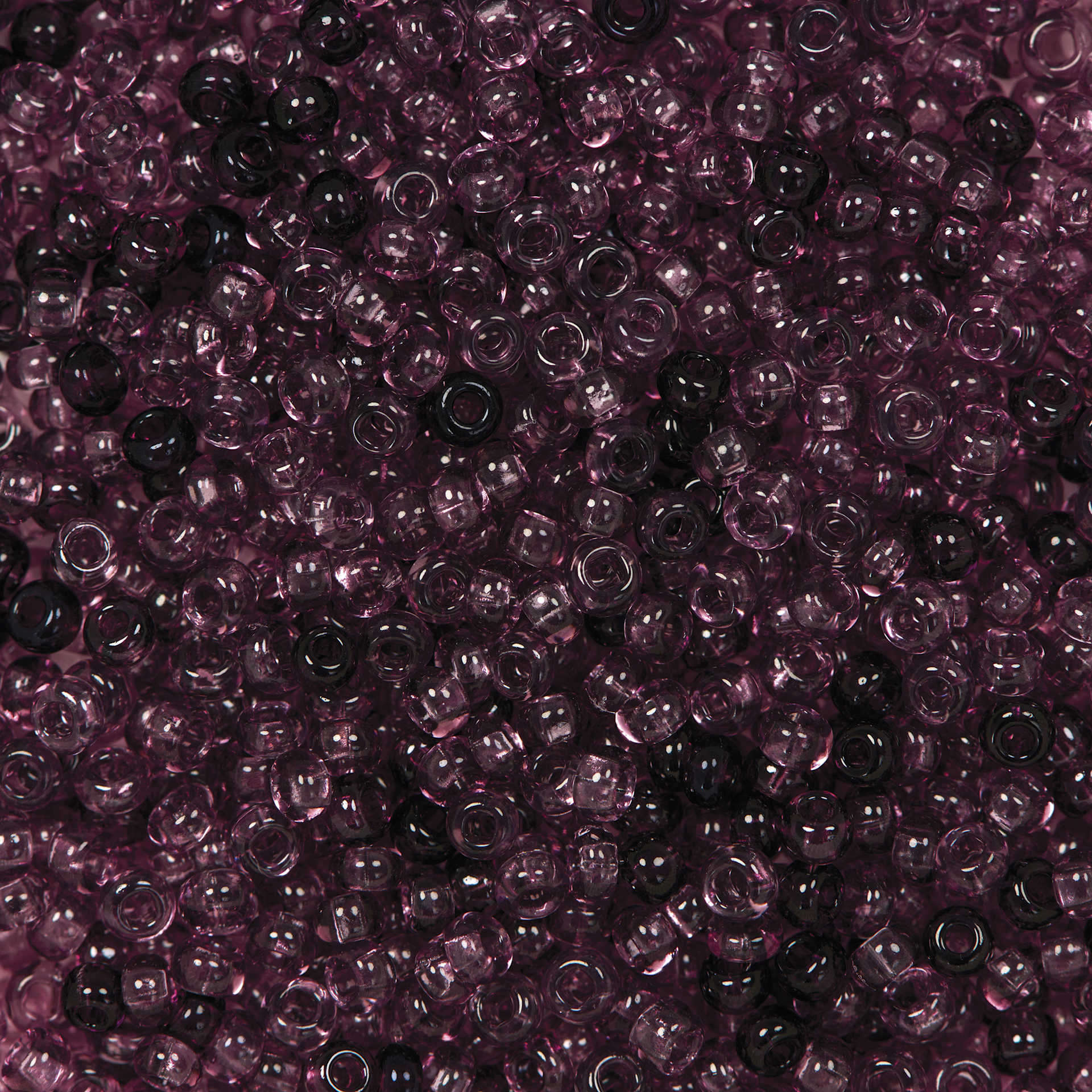 John Bead Czech Glass Seed Beads - Transparent Amethyst, Luster Mix, 10/0, 22 g Vial close up