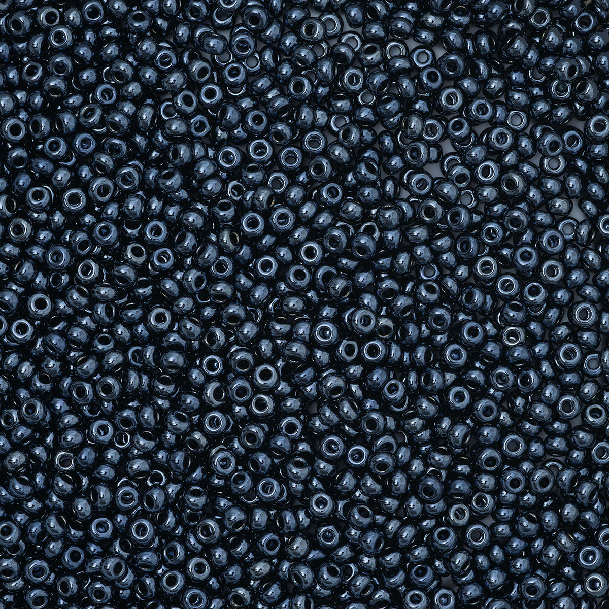 John Bead Czech Glass Seed Beads - Gunmetal, 10/0, 22 g Vial close up