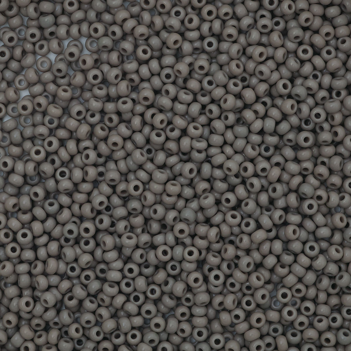 John Bead Czech Glass Seed Beads - Grey, 10/0, 22 g Vial close up
