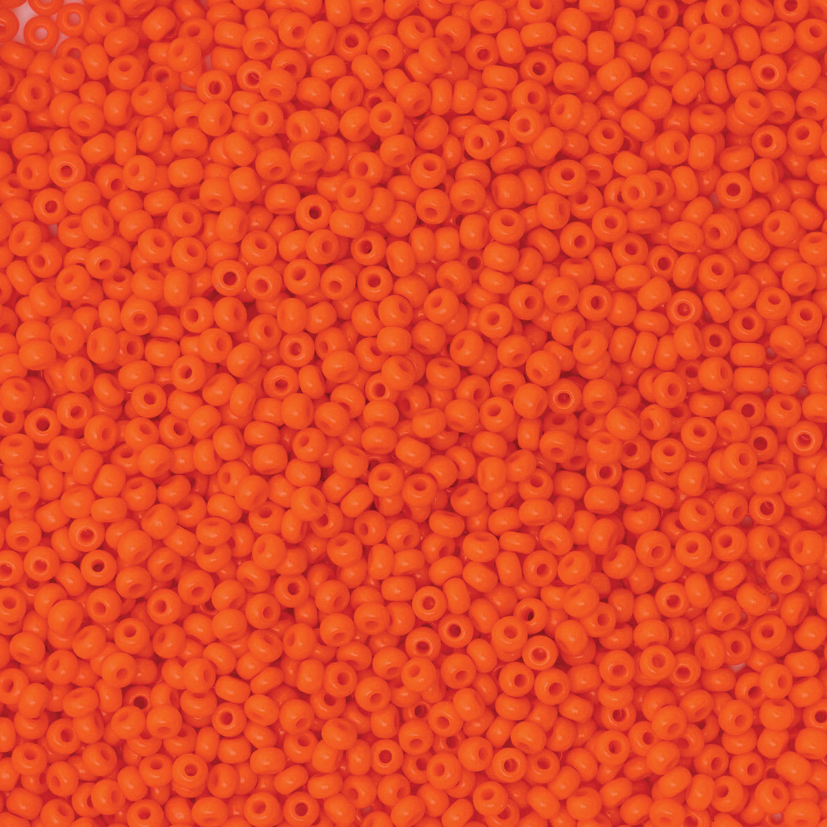John Bead Czech Glass Seed Beads - Orange, 10/0, 22 g Vial close up