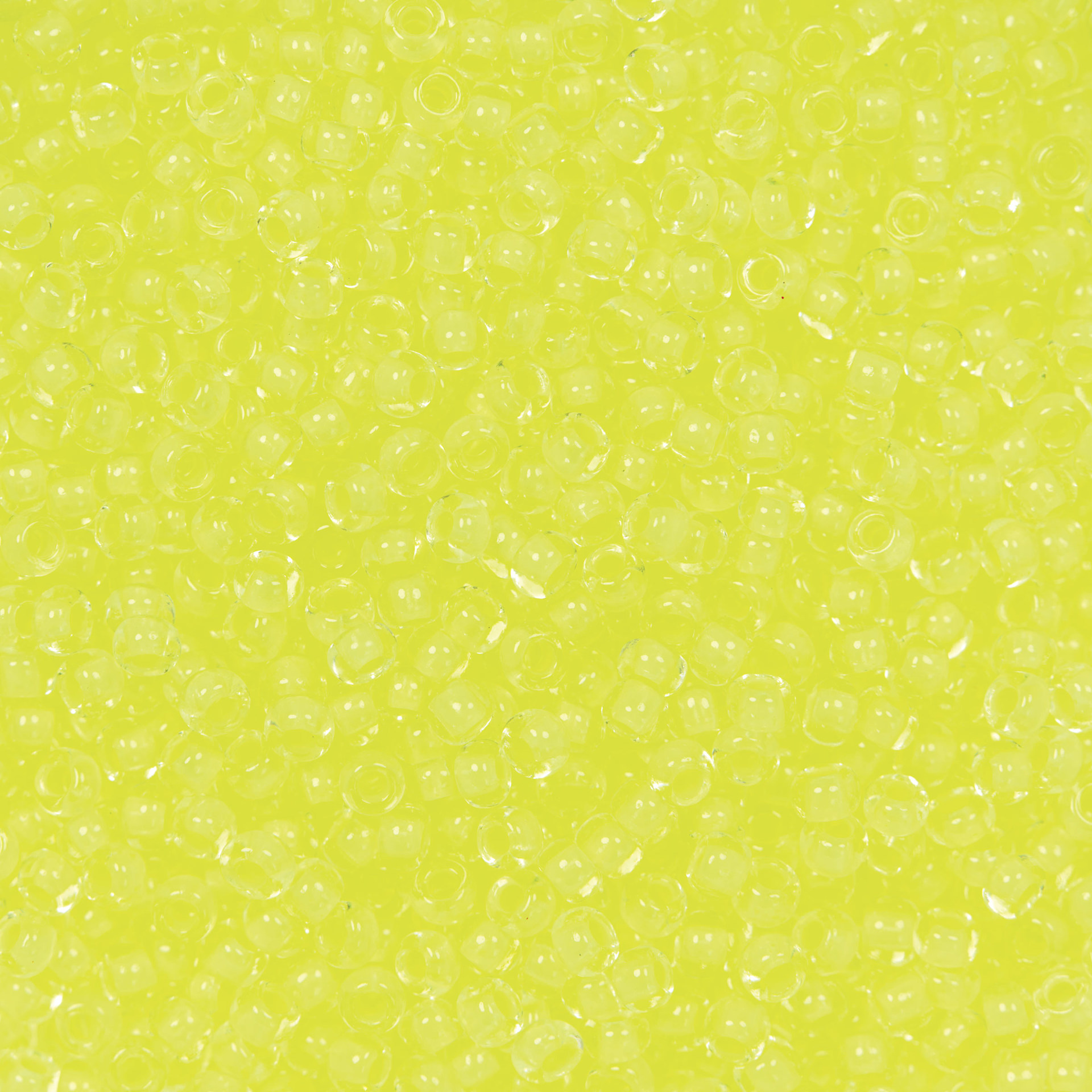 John Bead Czech Glass Seed Beads - Neon Yellow, Color Lined, 10/0, 22 g Vial close up