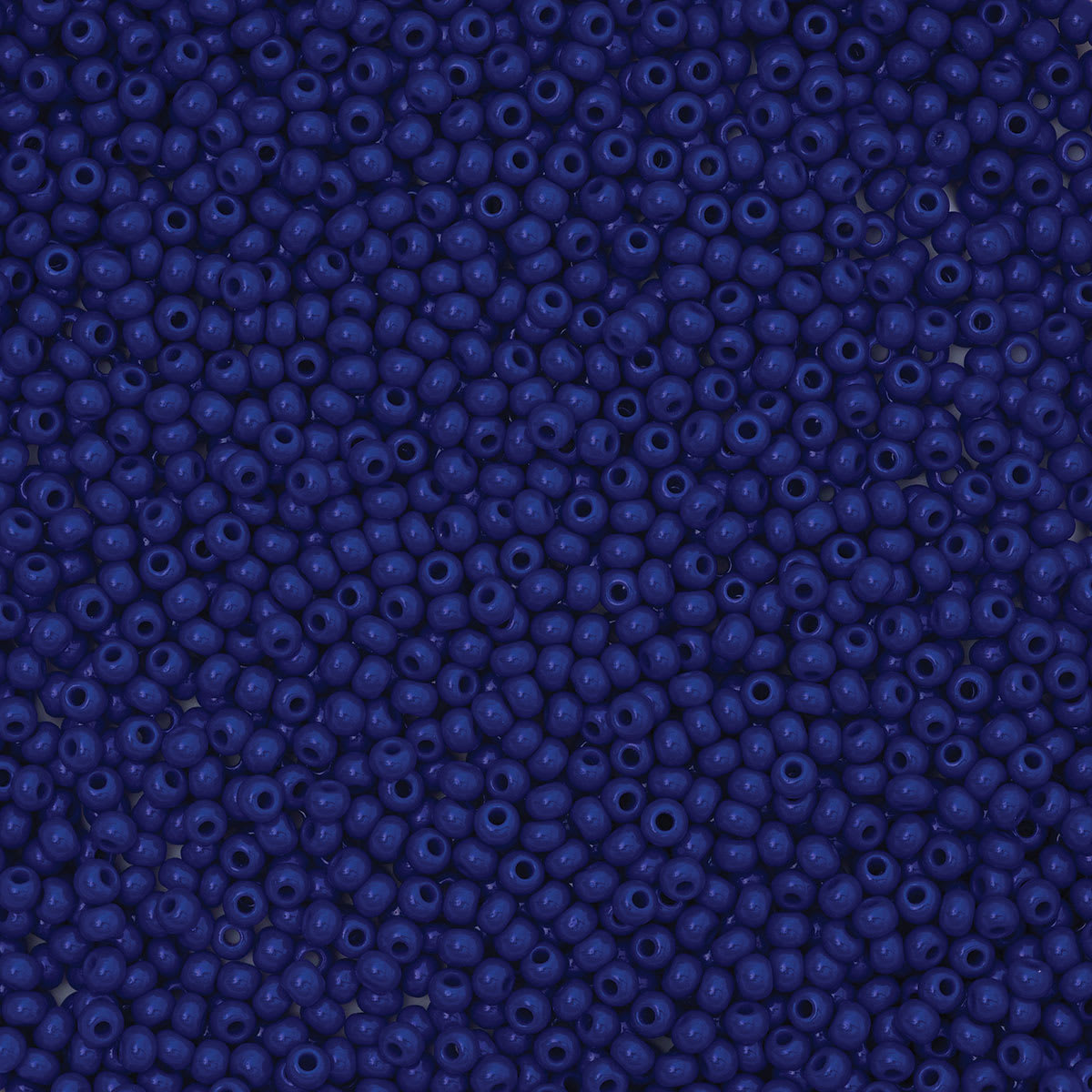 John Bead Czech Glass Seed Beads - Royal Blue, 10/0, 22 g Vial close up