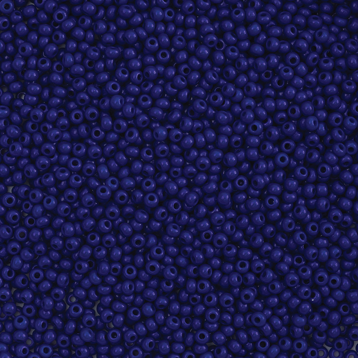 John Bead Czech Glass Seed Beads - Dark Royal Blue, 10/0, 22 g Vial close up
