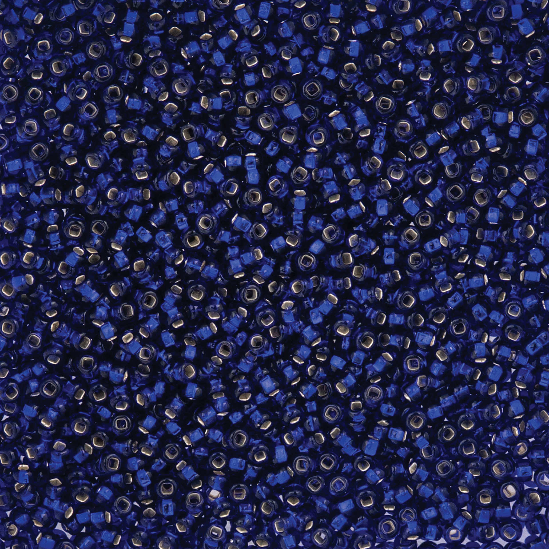 John Bead Czech Glass Seed Beads - Silver-Lined Royal Blue, 10/0, 22 g Vial close up