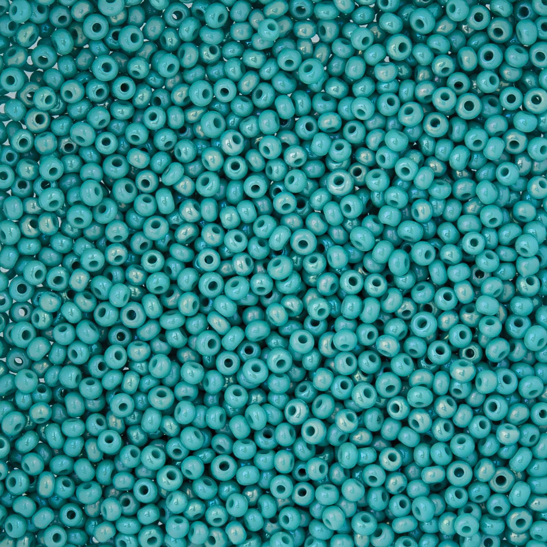 John Bead Czech Glass Seed Beads - Opaque Turquoise AB, 10/0, 22 g Vial close up