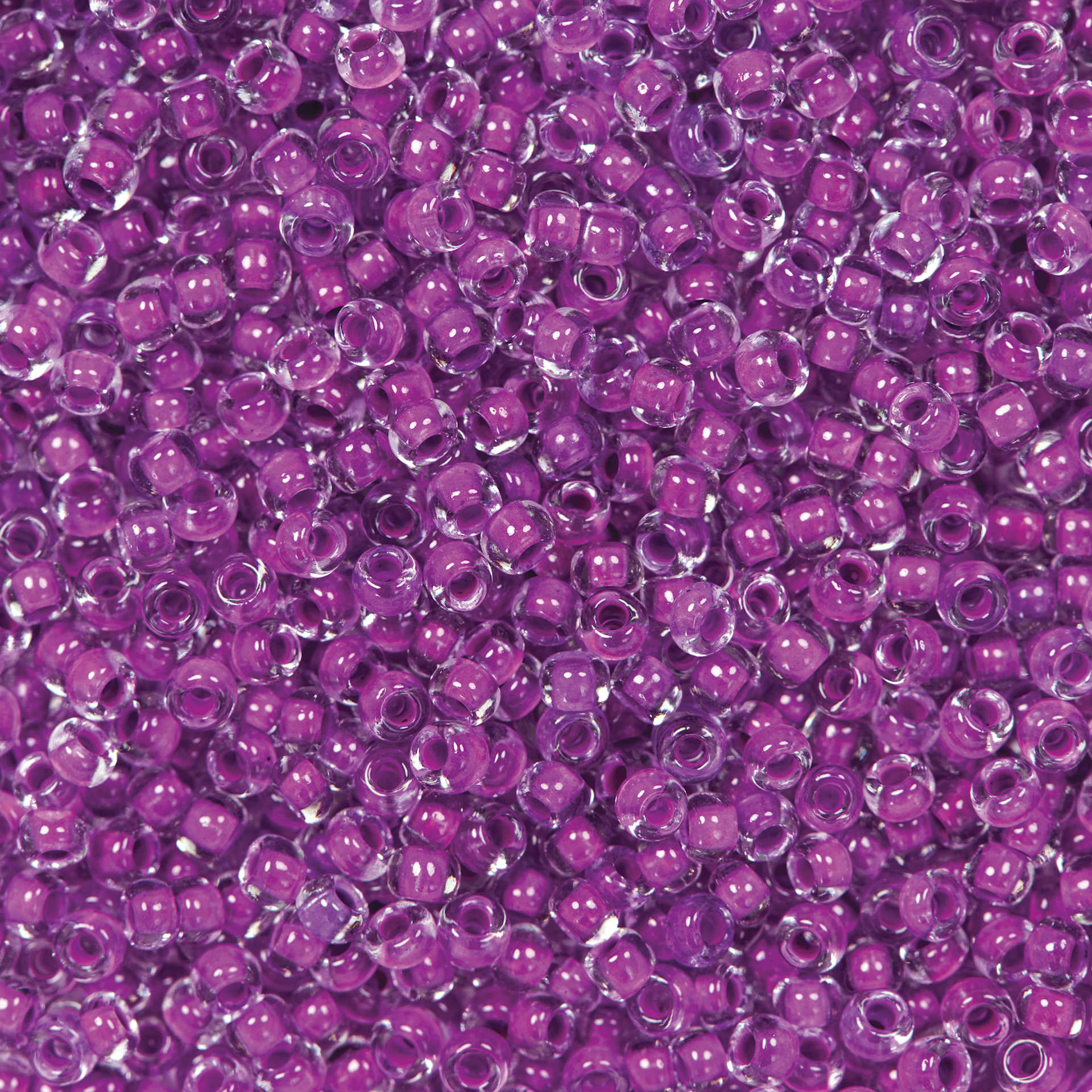 John Bead Czech Glass Seed Beads - Neon Purple, Color Lined, 10/0, 22 g Vial close up