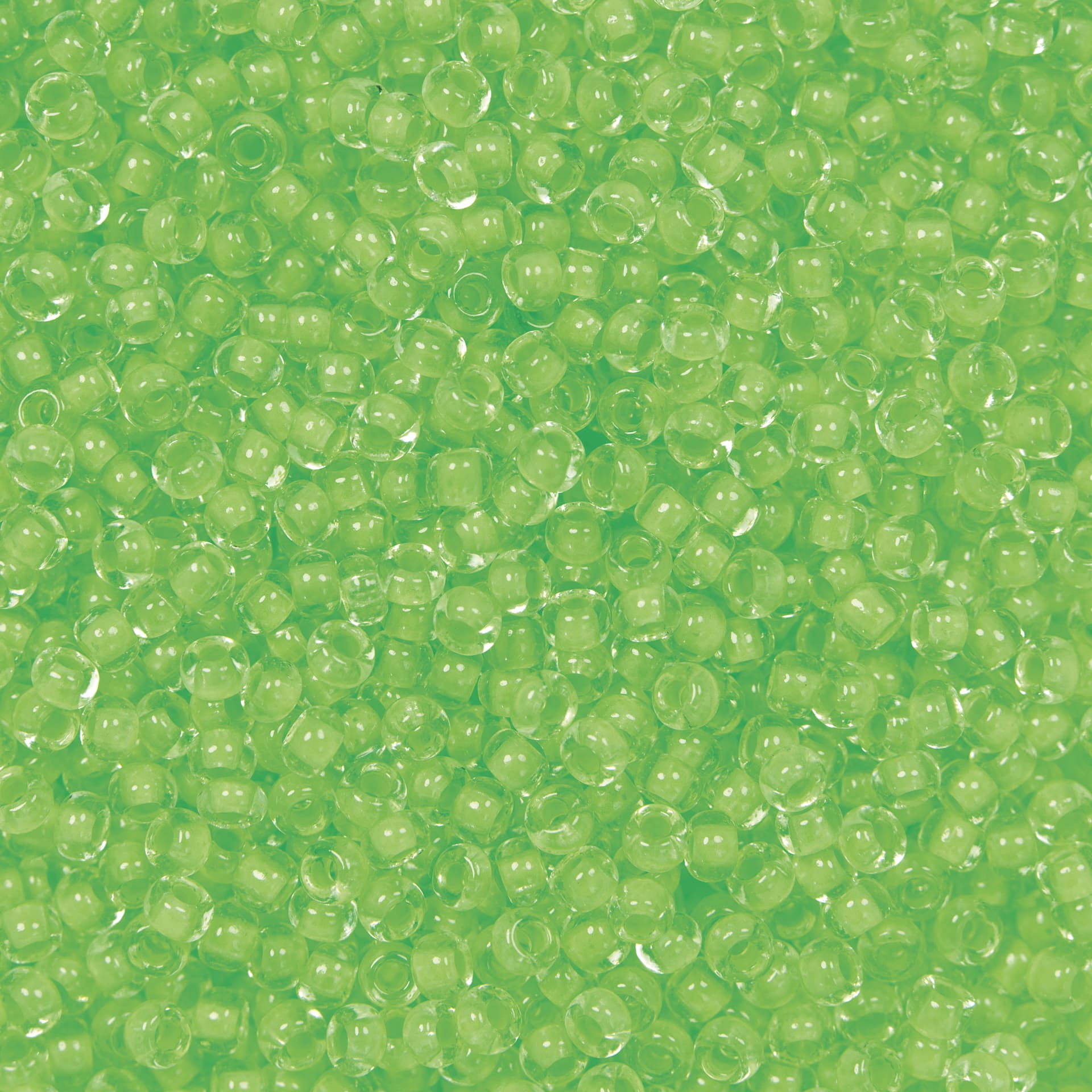 John Bead Czech Glass Seed Beads - Neon Green, Color Lined, 10/0, 22 g Vial close up