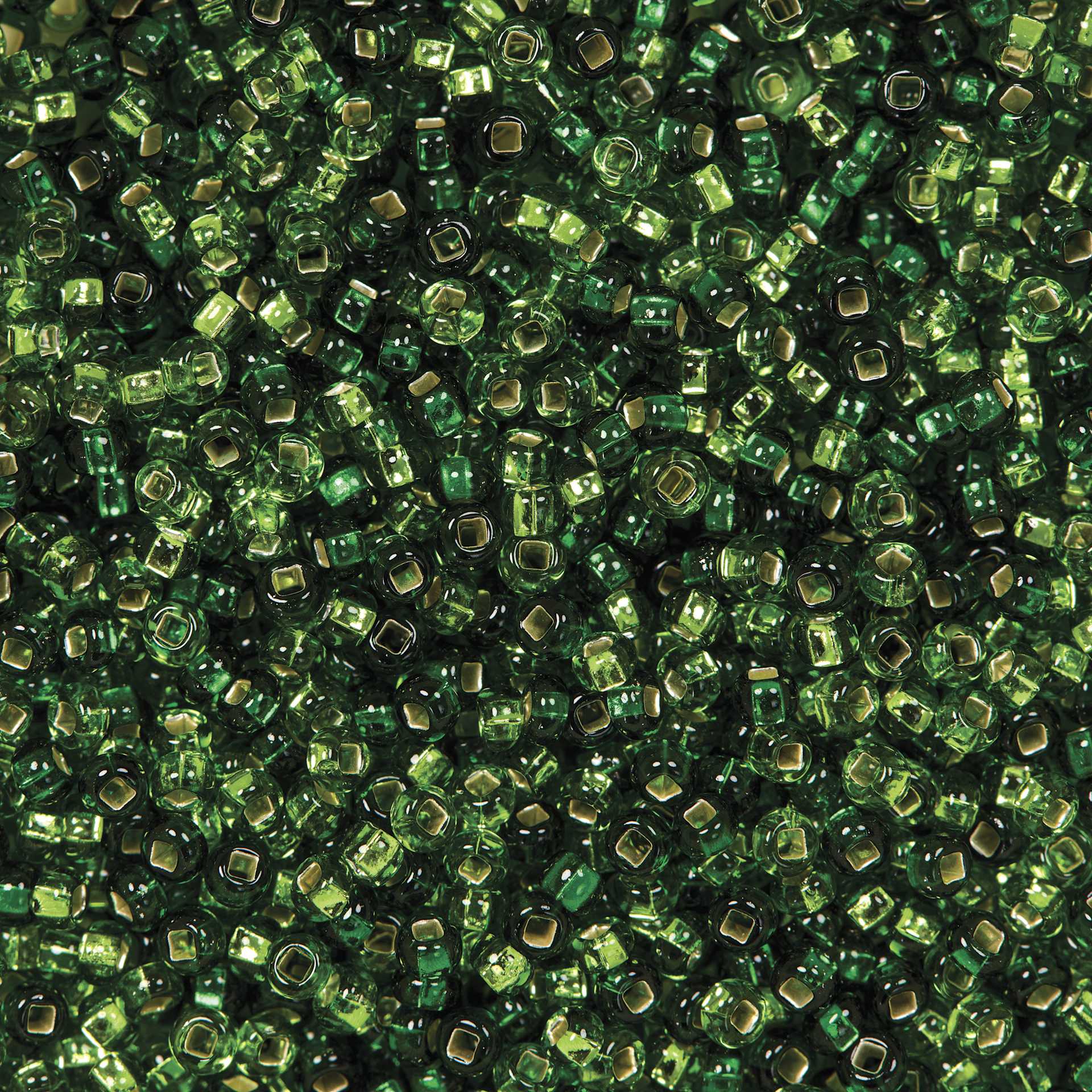 John Bead Czech Glass Seed Beads - Silver-Lined Sea Green, 10/0, 22 g Vial close up