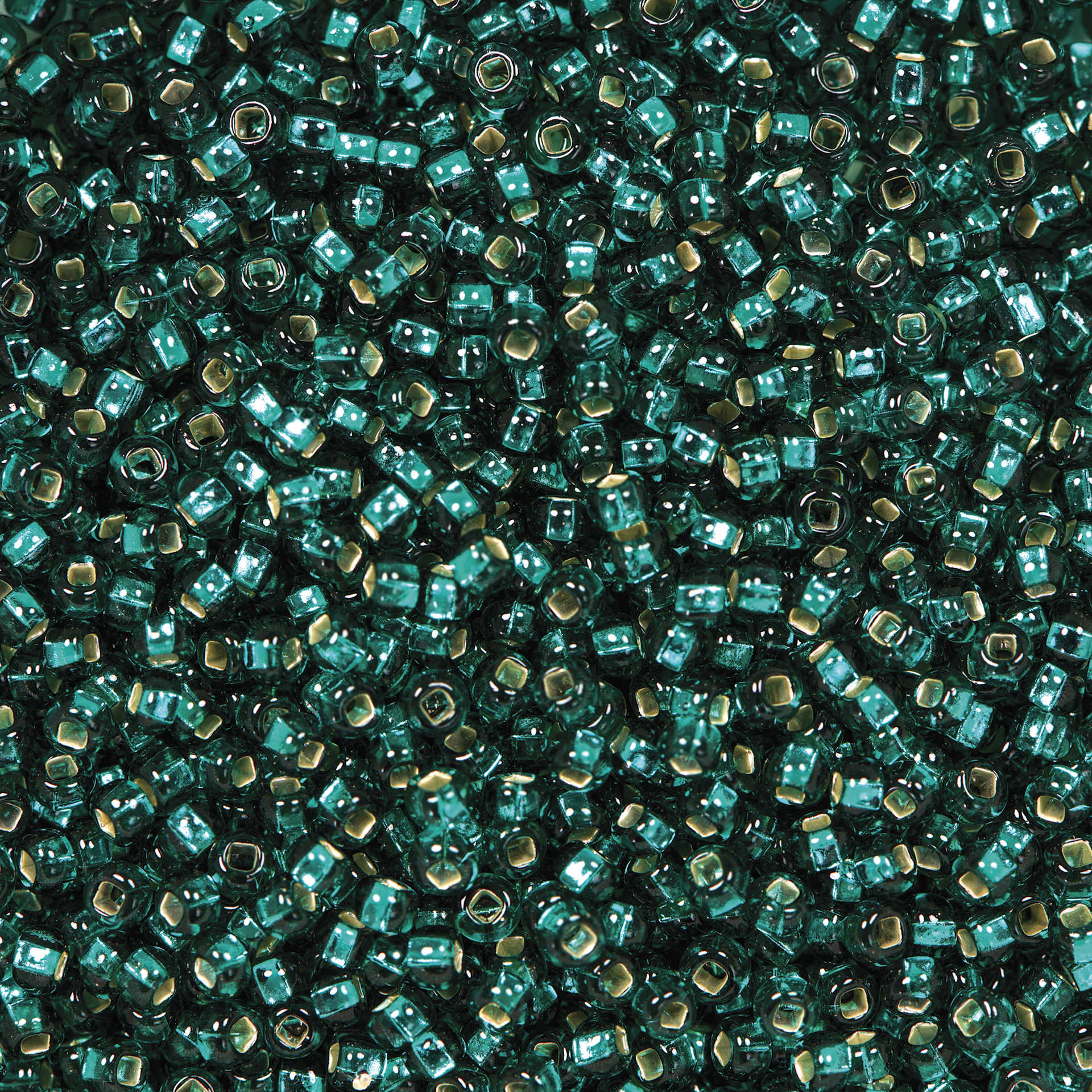 John Bead Czech Glass Seed Beads - Teal Green, Silver Lined, 10/0, 22 g Vial close up