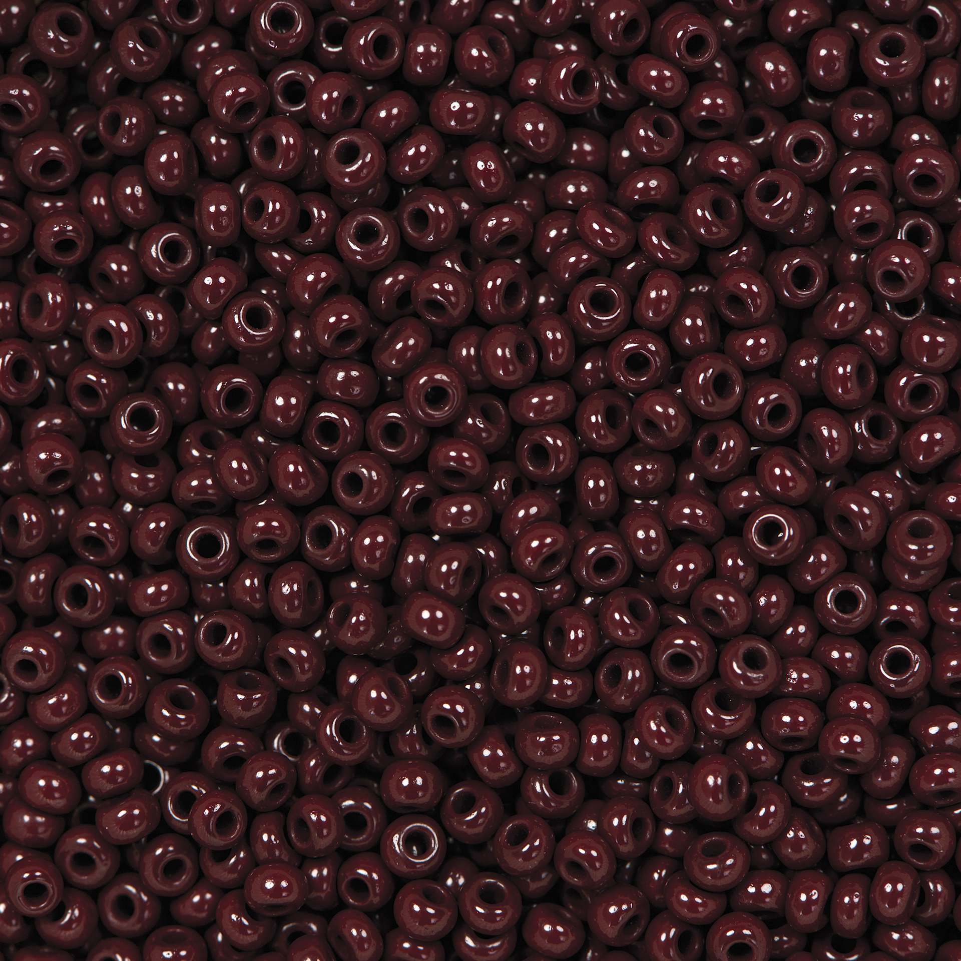 John Bead Czech Glass Seed Beads - Dark Brown, Opaque, 10/0, 22 g Vial close up