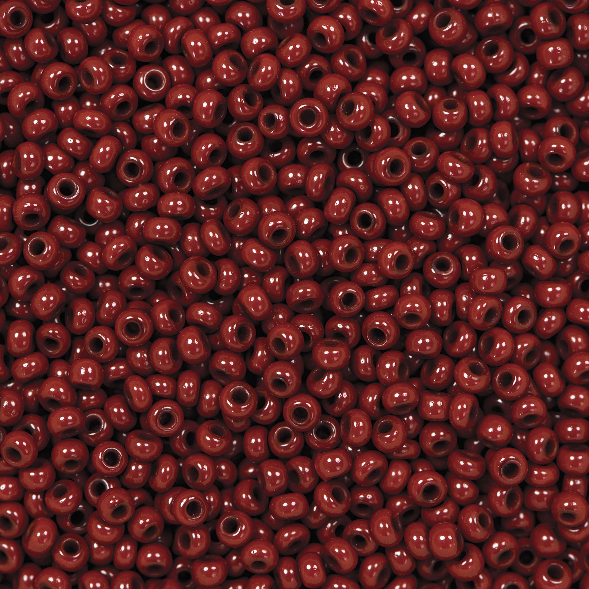 John Bead Czech Glass Seed Beads - Light Brown, Opaque, 10/0, 22 g Vial close up