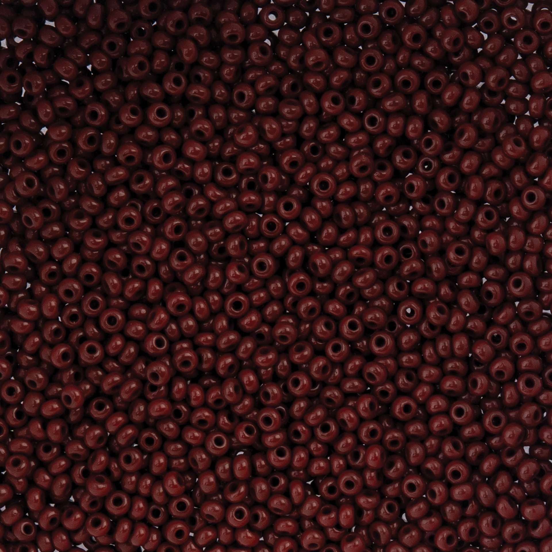 John Bead Czech Glass Seed Beads - Opaque Medium Brown, 10/0, 22 g Vial close up