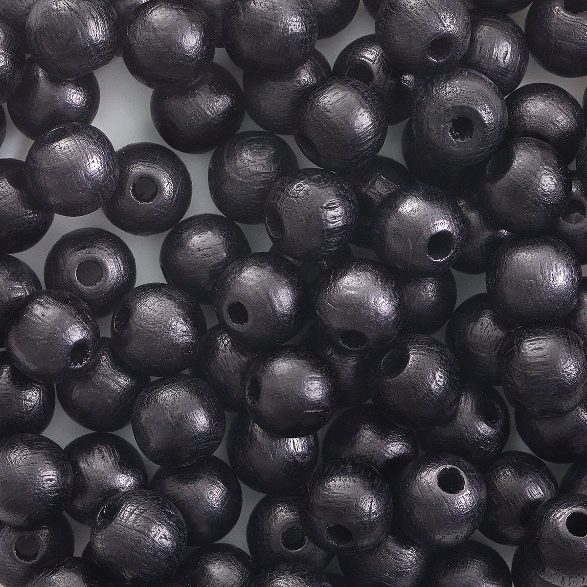 John Bead Euro Wood Beads - Black, Round, 8 mm, Pkg of 100 - close-up of beads