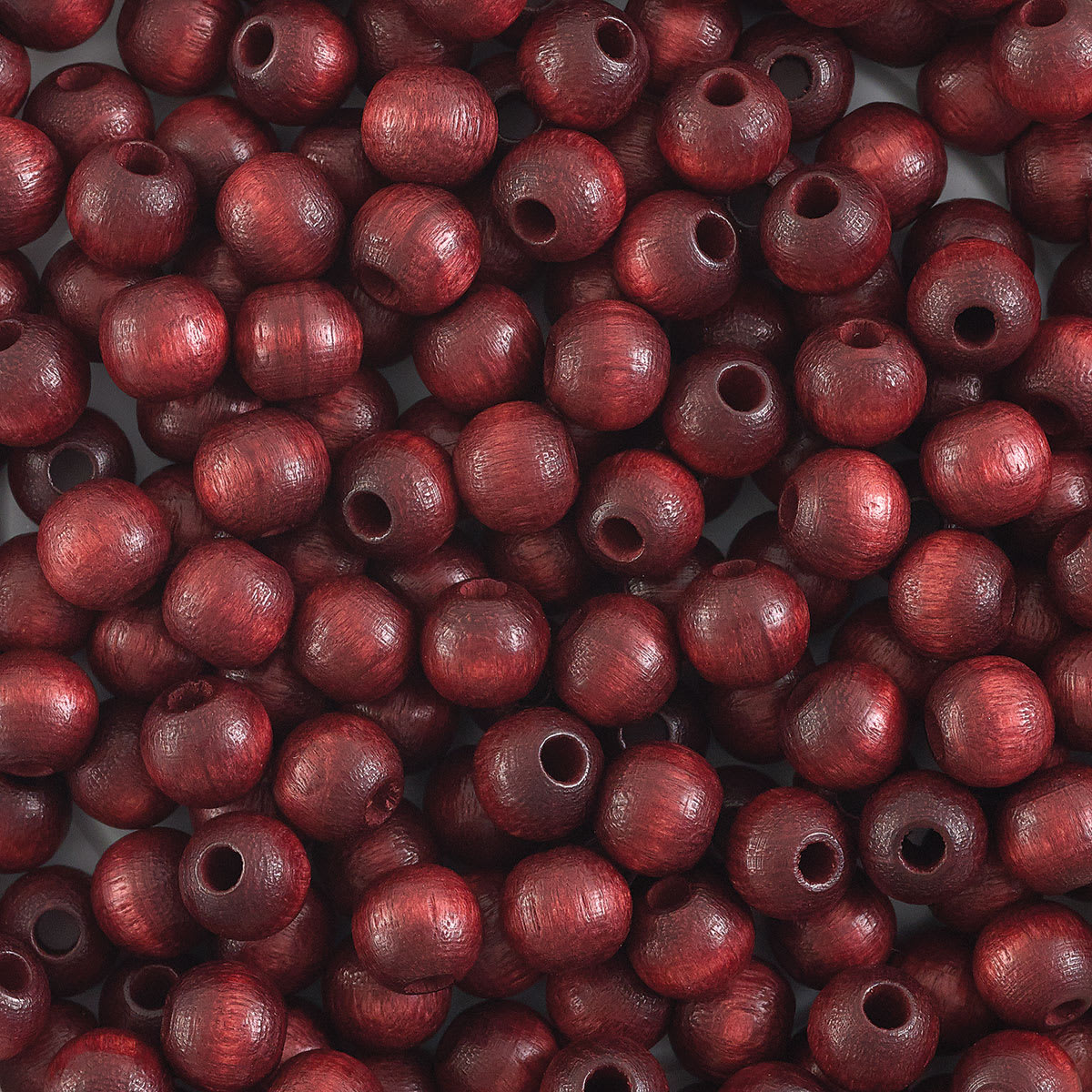 John Bead Euro Wood Beads - Mahogany, Round, 6 mm - close-up of beads
