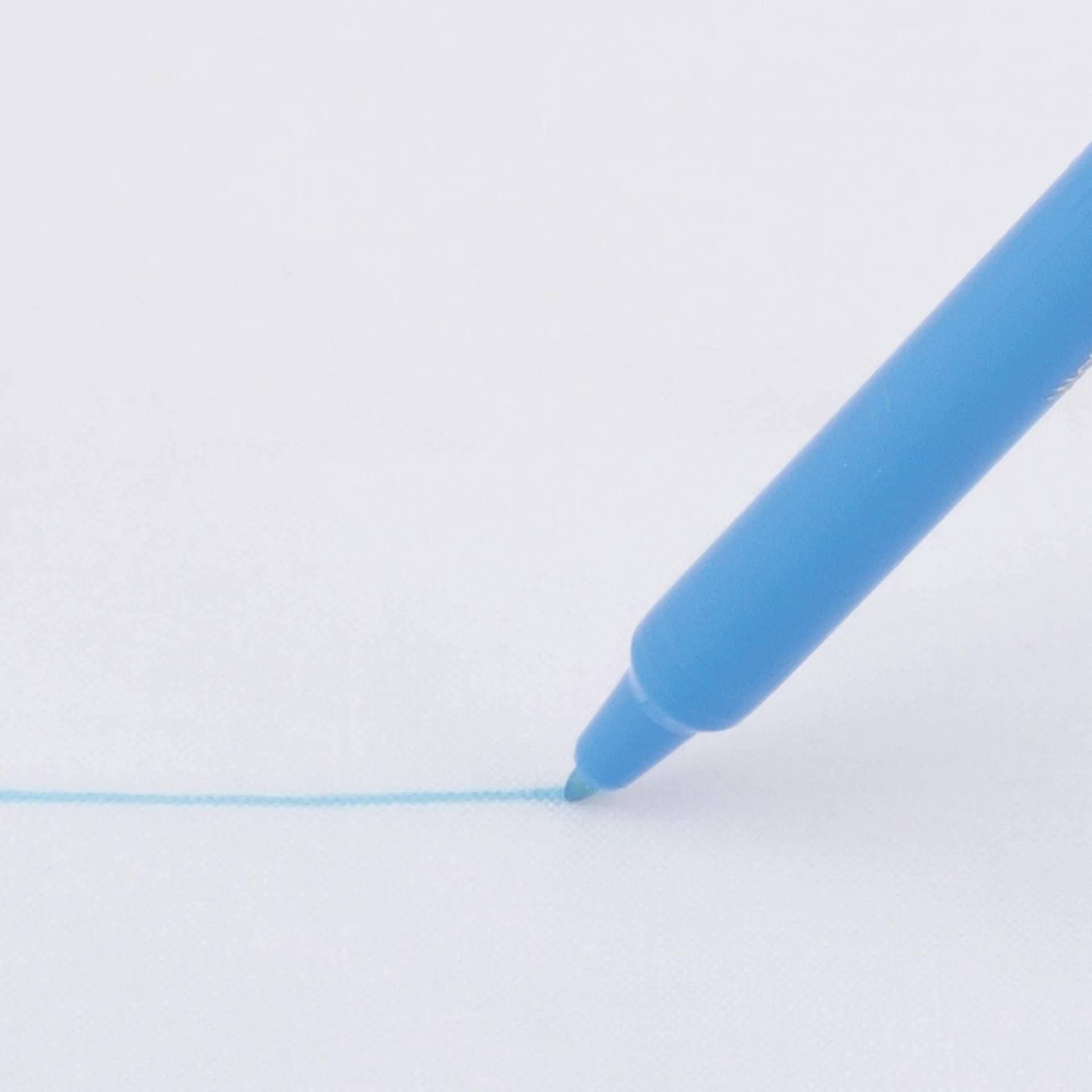 Dritz Mark-B-Gone Marking Pen - Blue, making a line