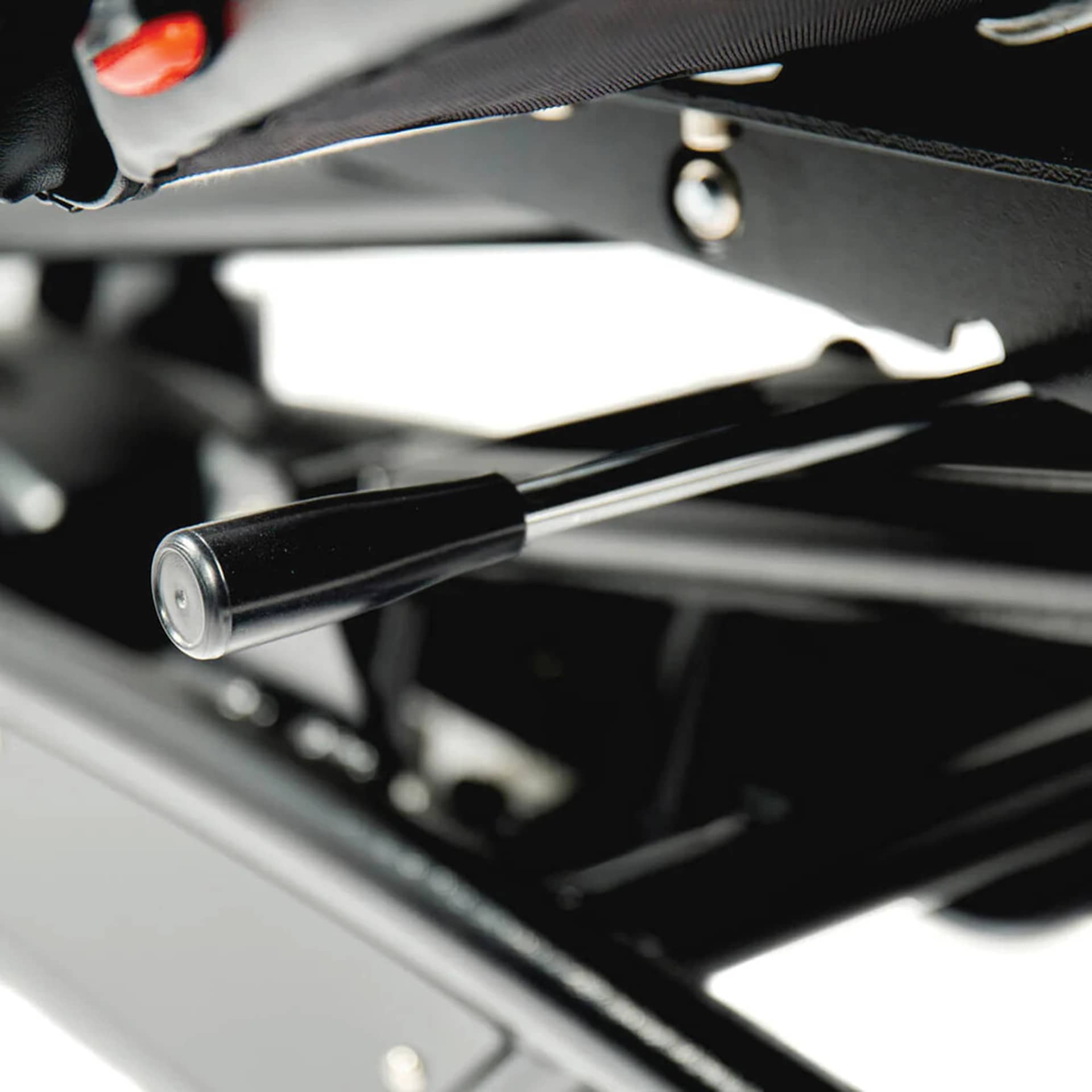 TatSoul Oros Adjustable Tattoo Client Bed, close-up of lever