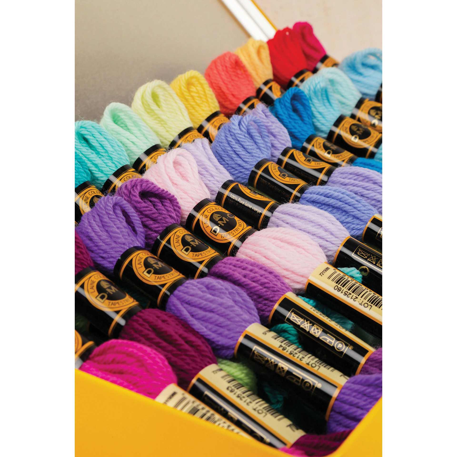 DMC Tapestry Wool Collector's Tin - Set of 24, Assorted Colors close-up of contents
