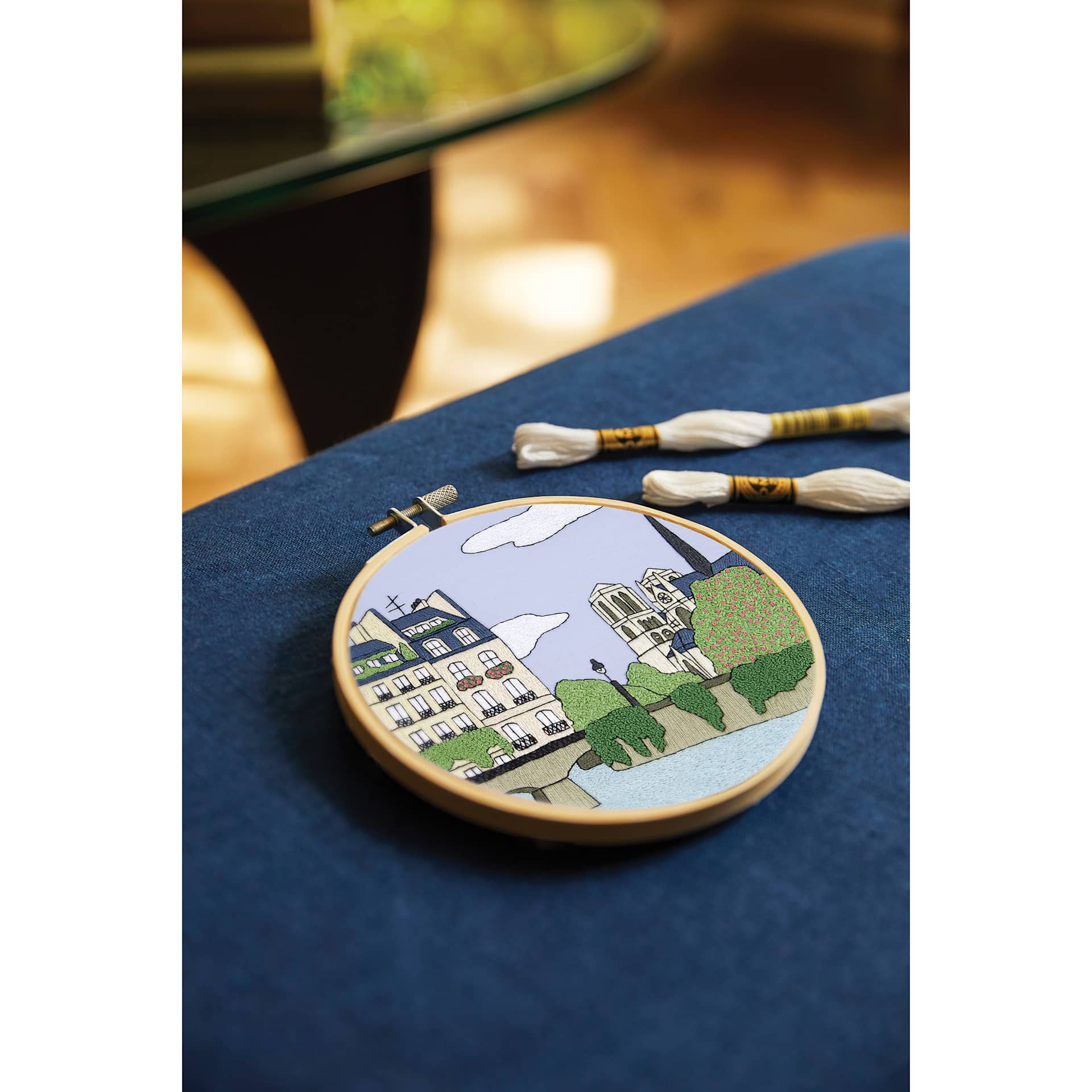 DMC The Designer Collection Embroidery Kits - “Paris” by Kseniia Guseva, Intermediate finished example on table