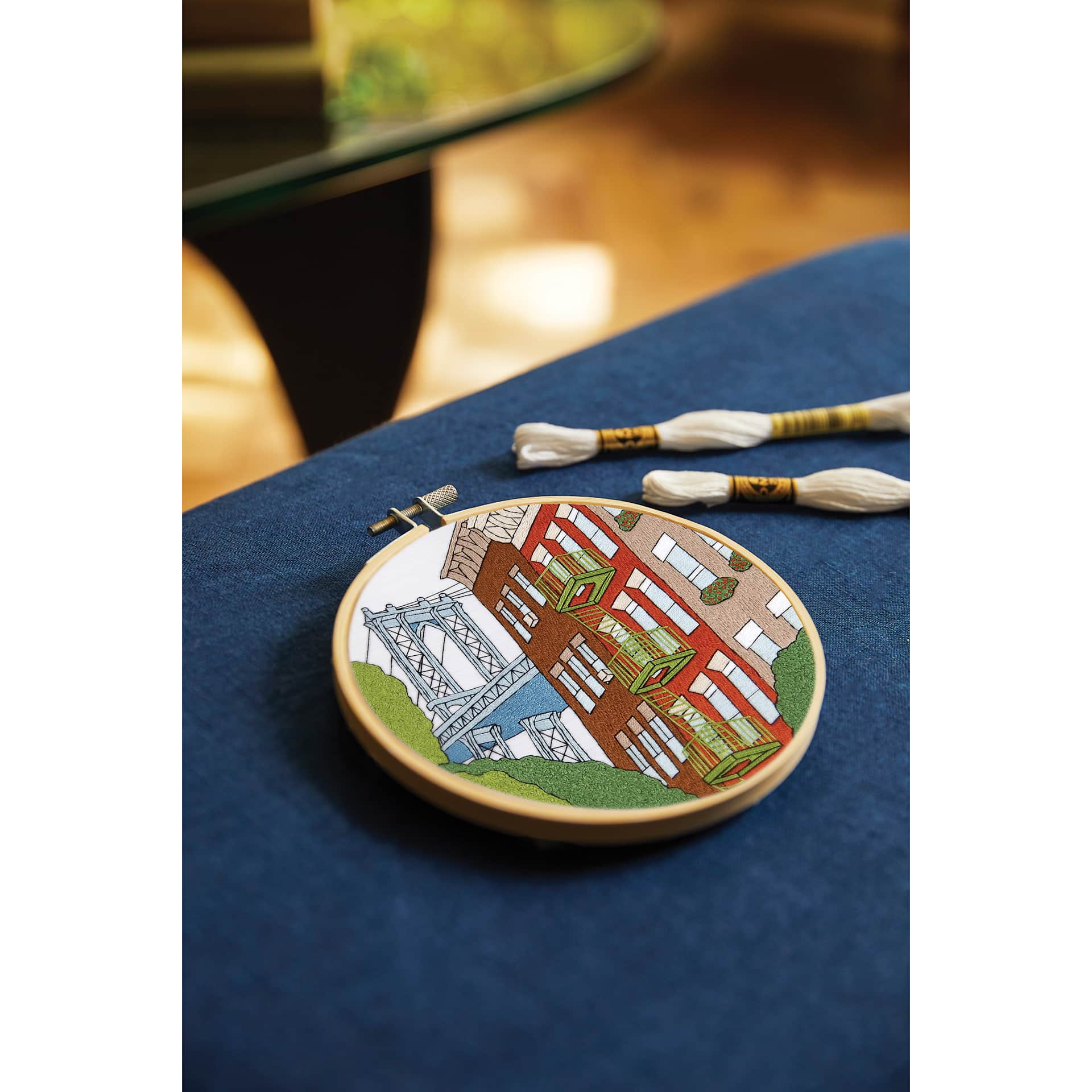 DMC The Designer Collection Embroidery Kits - “New York” by Kseniia Guseva, Intermediate finished example on table