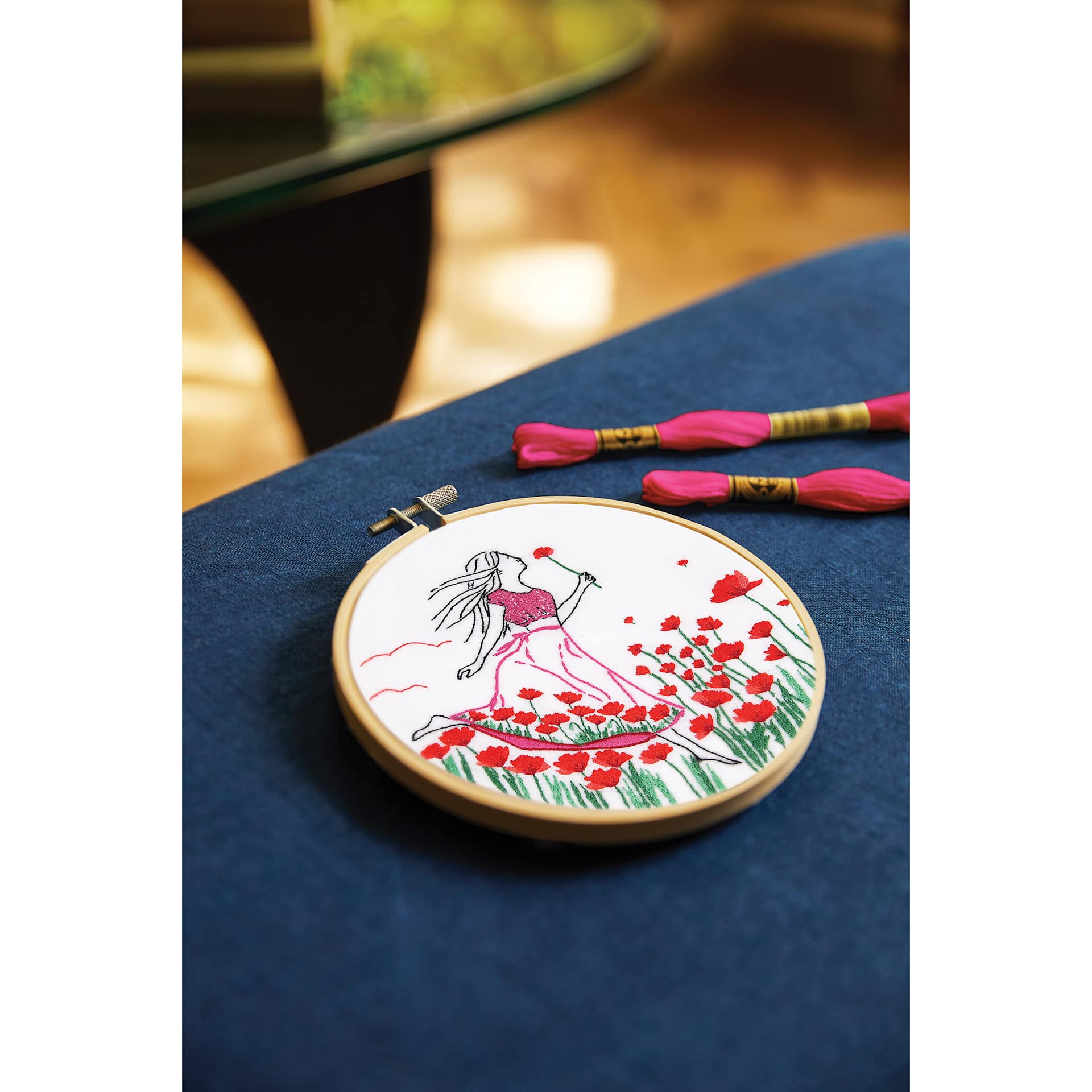 DMC The Designer Collection Embroidery Kits - “Romantic Poppies” by Nathalie Weinzaepflen, Beginner finished example on bed
