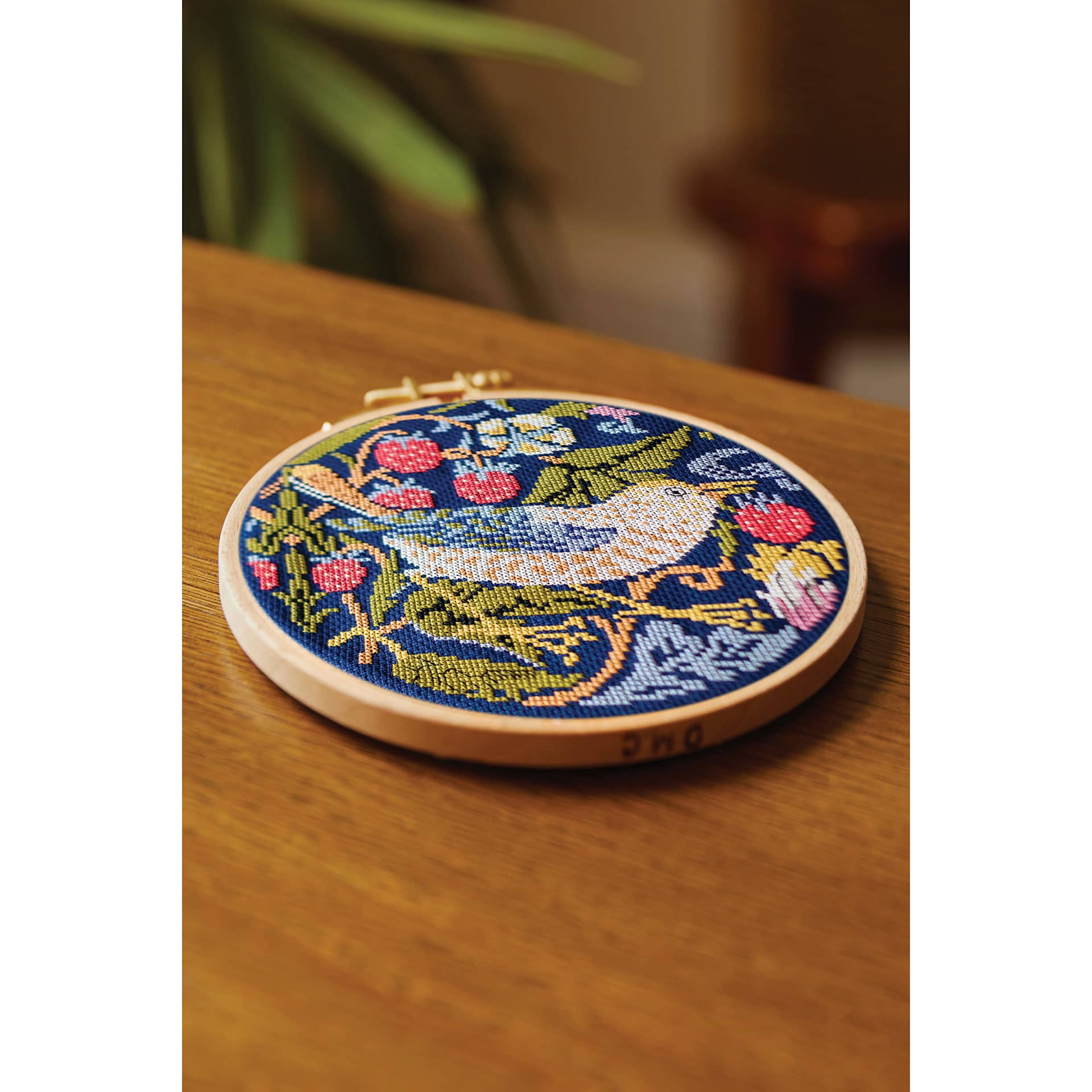 DMC The Masters Collection Cross Stitch Kit - “Strawberry Thief” by William Morris, on table