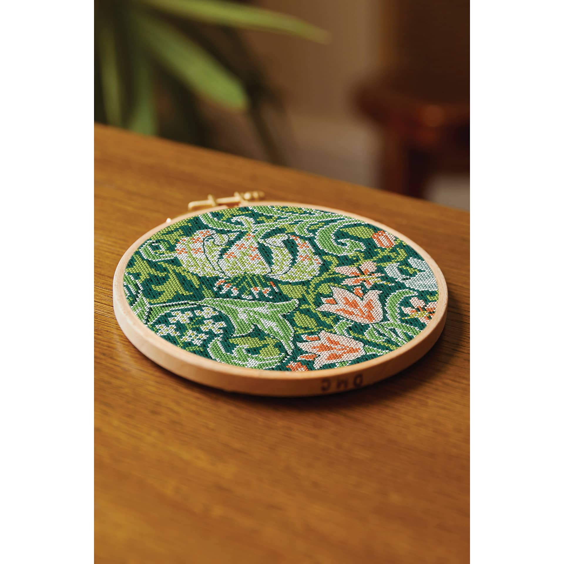 DMC The Masters Collection Cross Stitch Kit - “Golden Lily” by J.H. Dearle, on a table