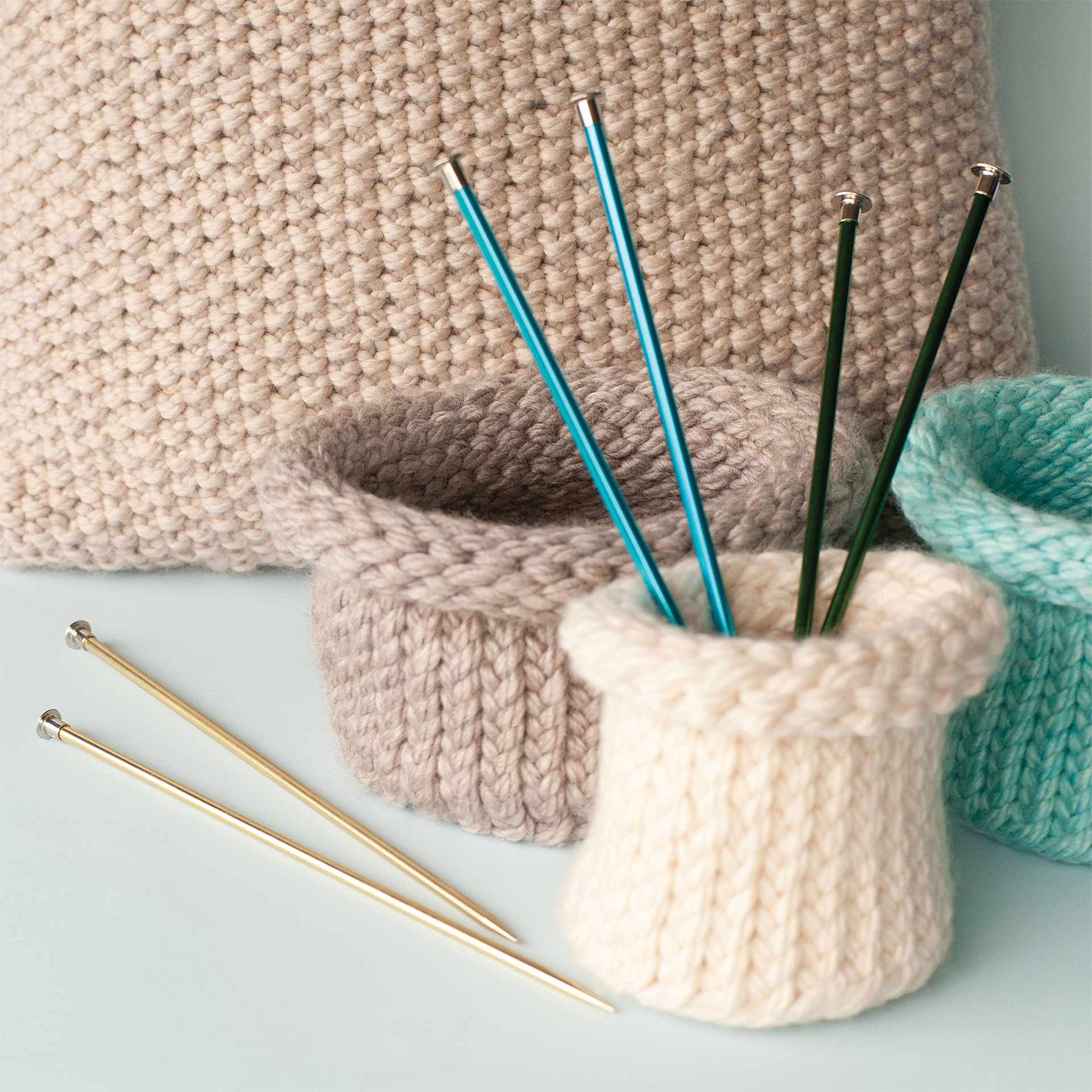 Boye Aluminum Knitting Needles - Set of 3, US 8/9/10, 10" - with finished knit cup cozy examples