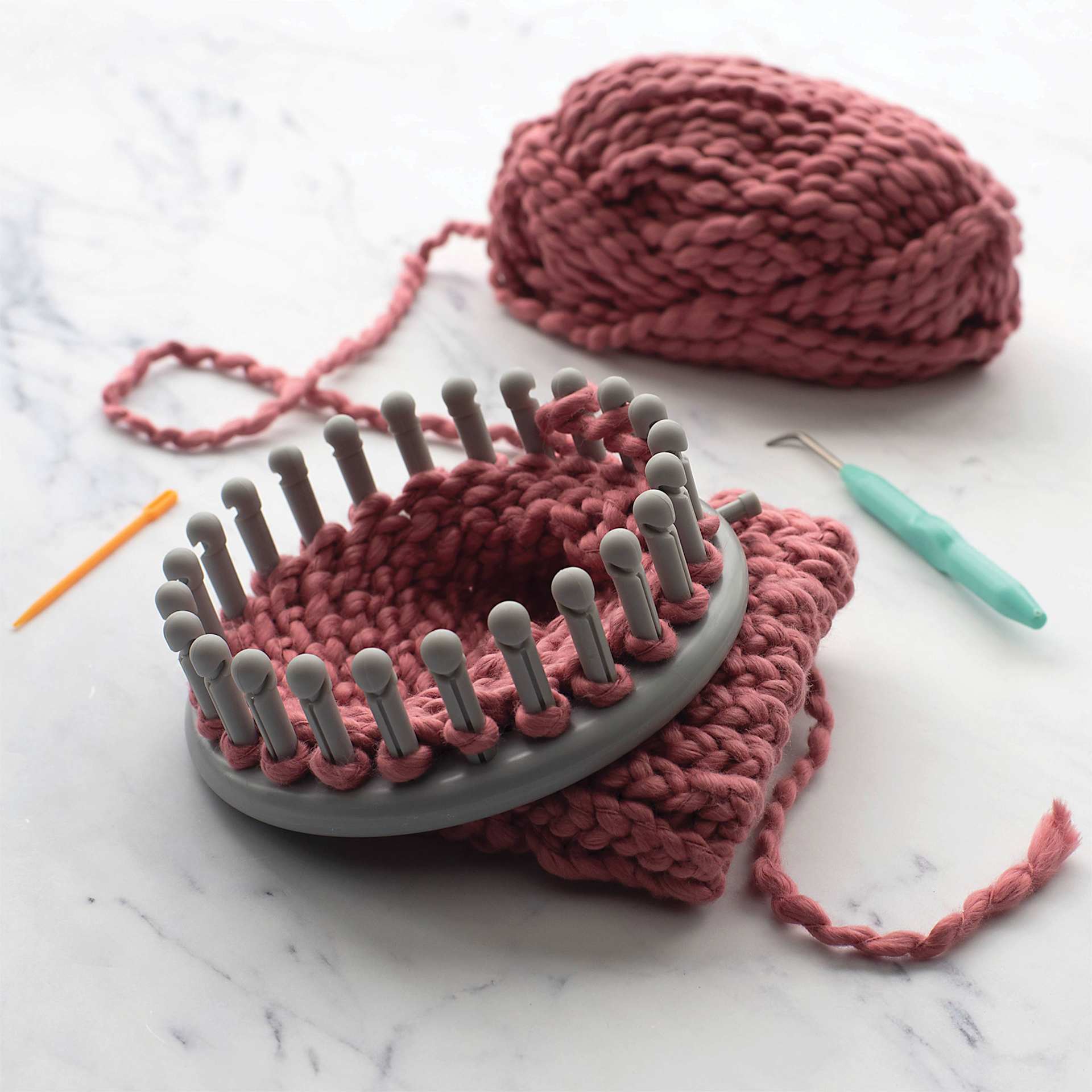 Boye Looms - Small round loom in use (yarn not included)