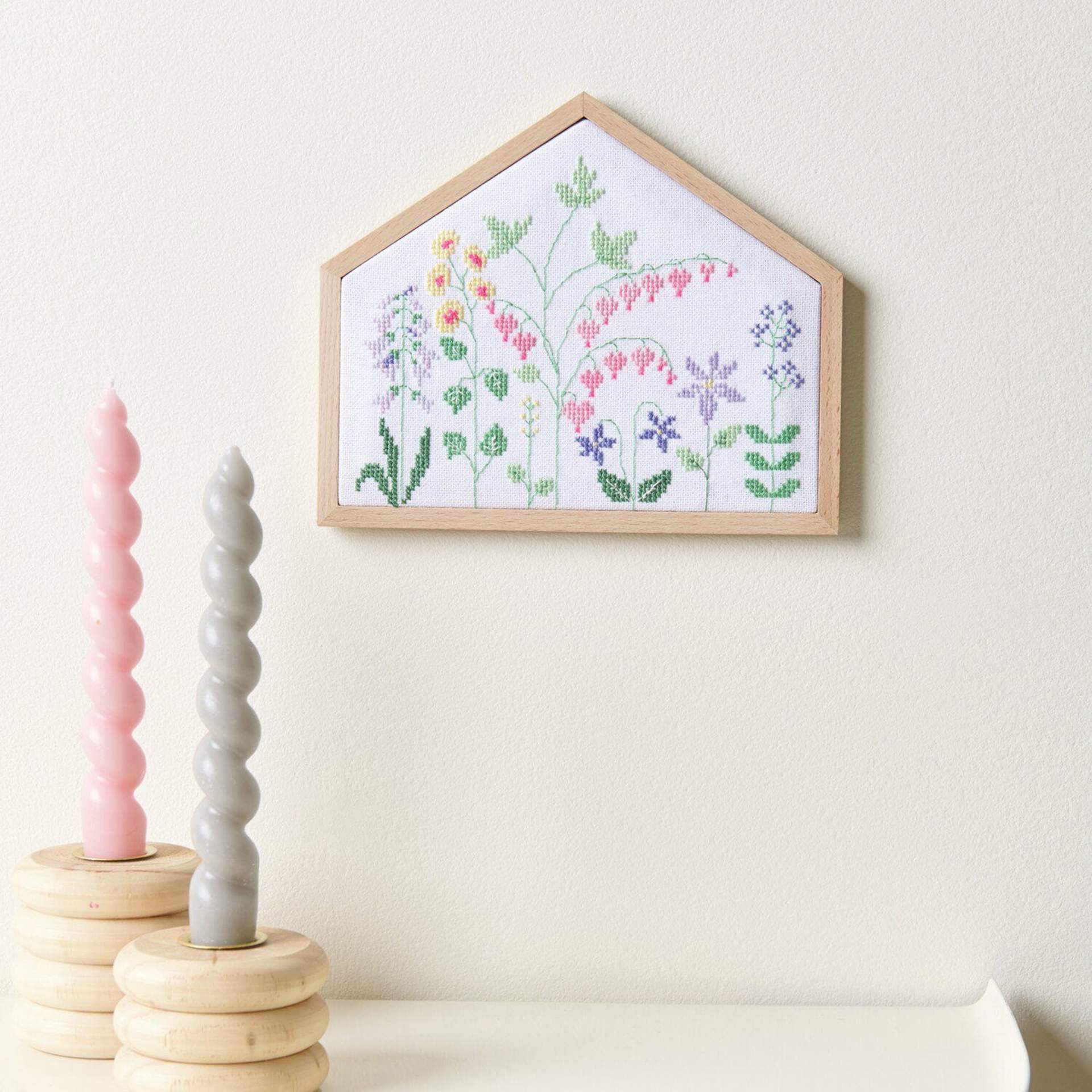Rico Design Counted Cross Stitch House Kit - Flower Meadow House completed project mounted to wall