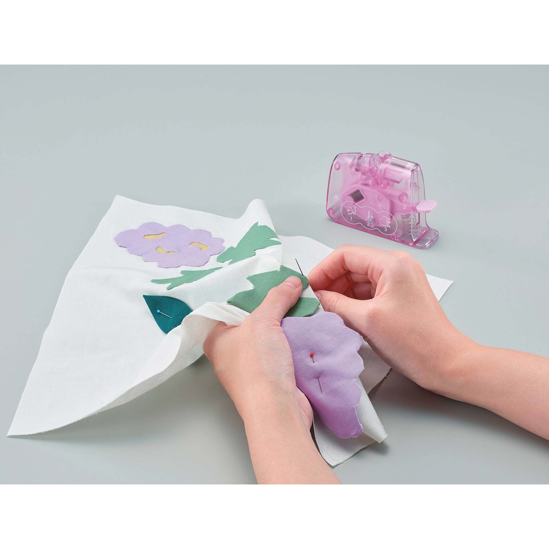 Clover Quick Desktop Needle Threader - Dark Pink - in use