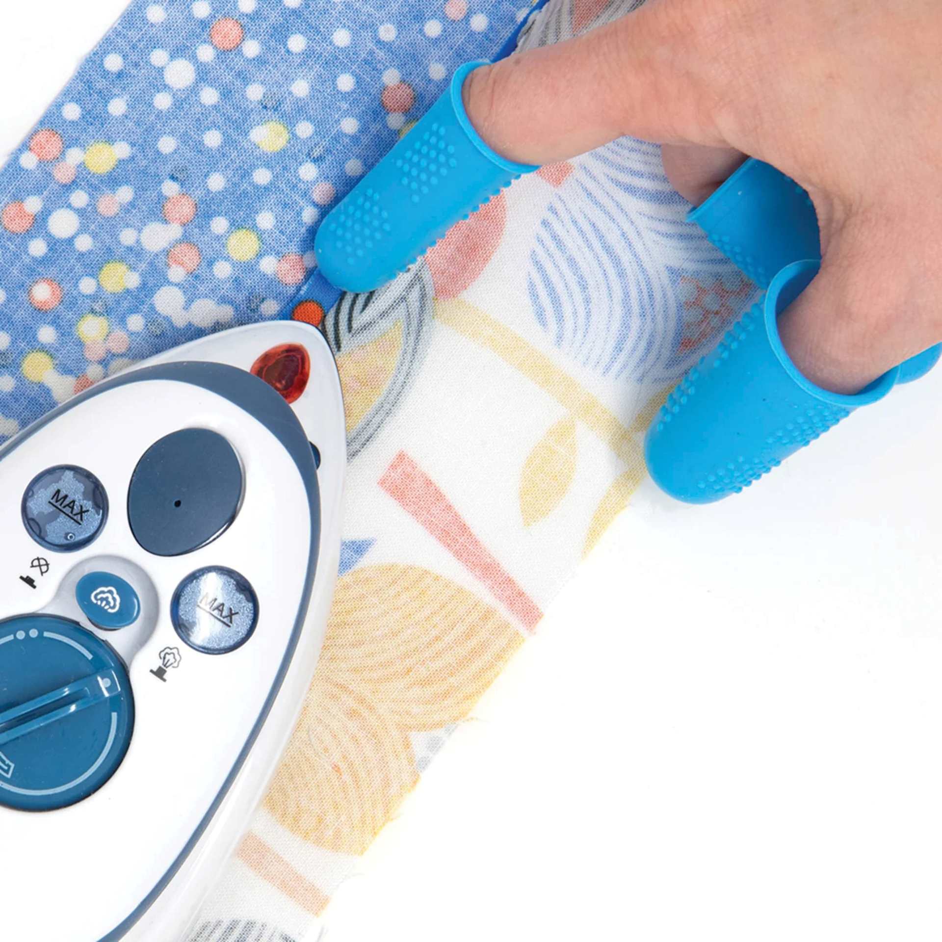 Dritz Mighty Steam Iron - in use with silicone finger tip protectors (not included)