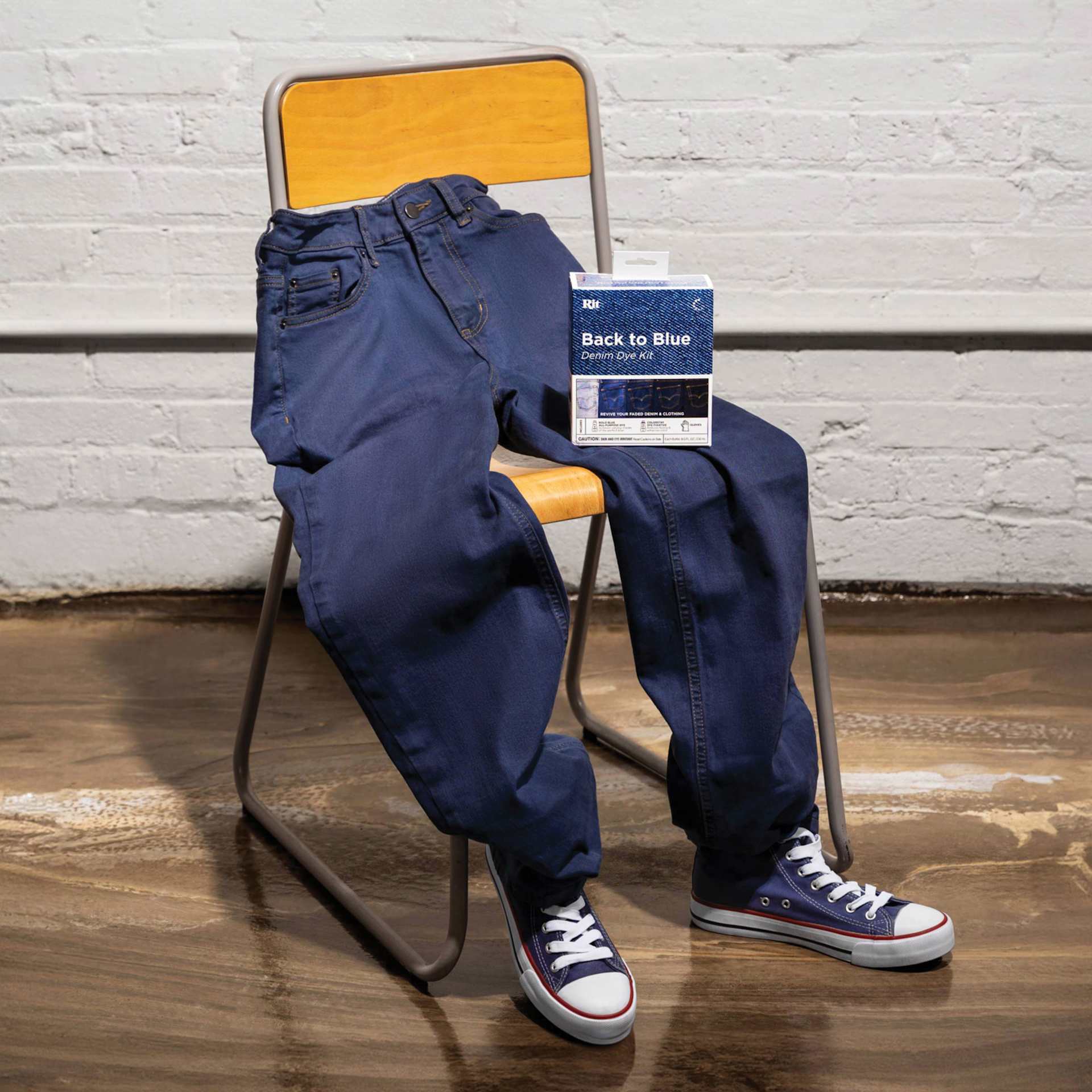 Rit Back to Blue Denim Dye Kit - finished jeans and shoes posed on chair