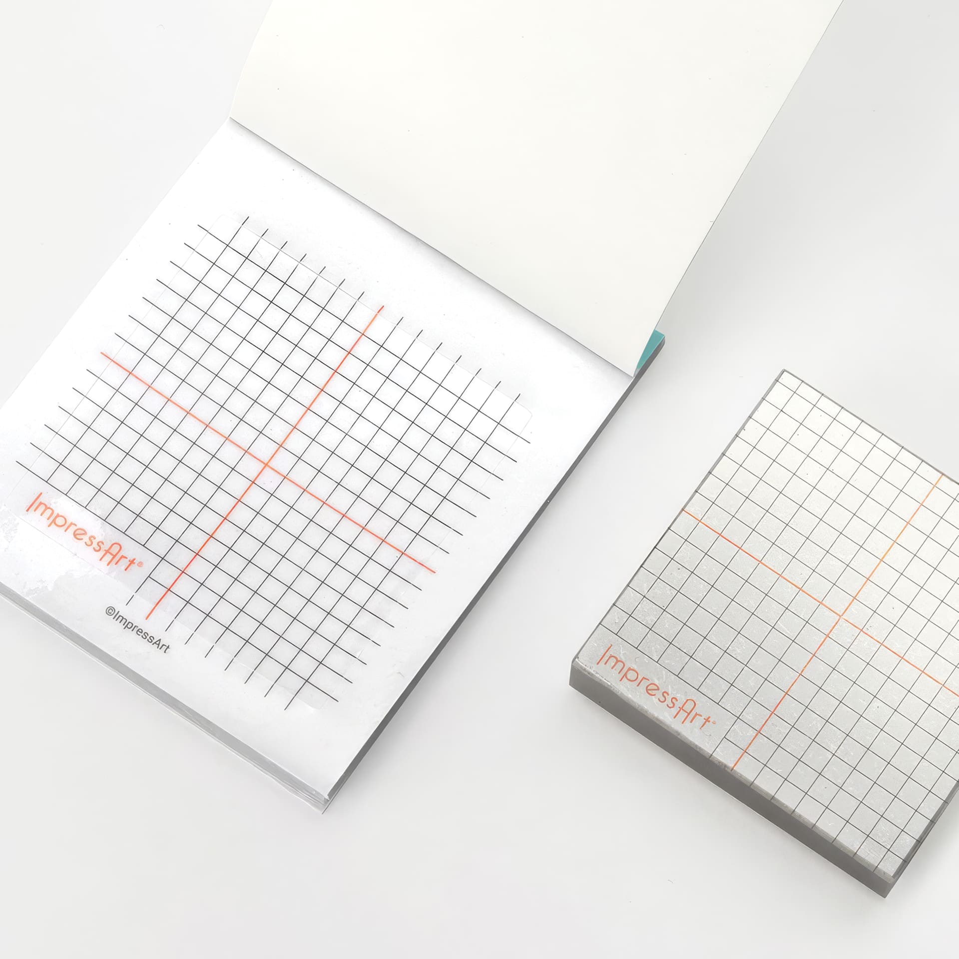 ImpressArt Scratch Protector Book - 2 in x 2 in, 20 Sheets opened showing sheet