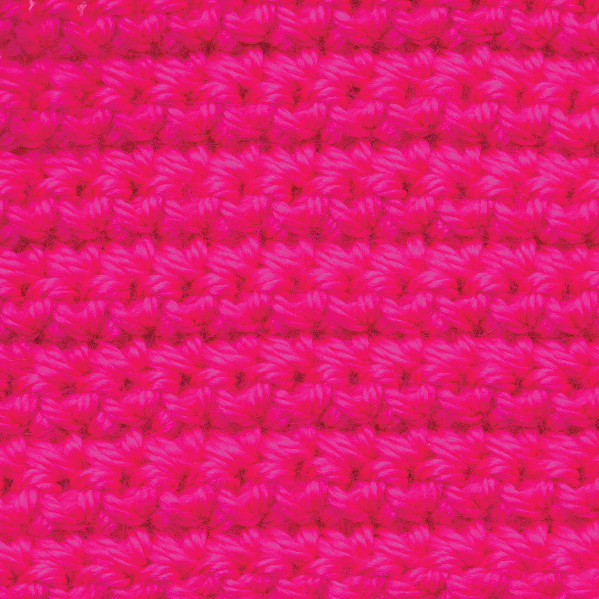 Caron Simply Soft Yarn - Neon Pink close up to show knitted pattern
