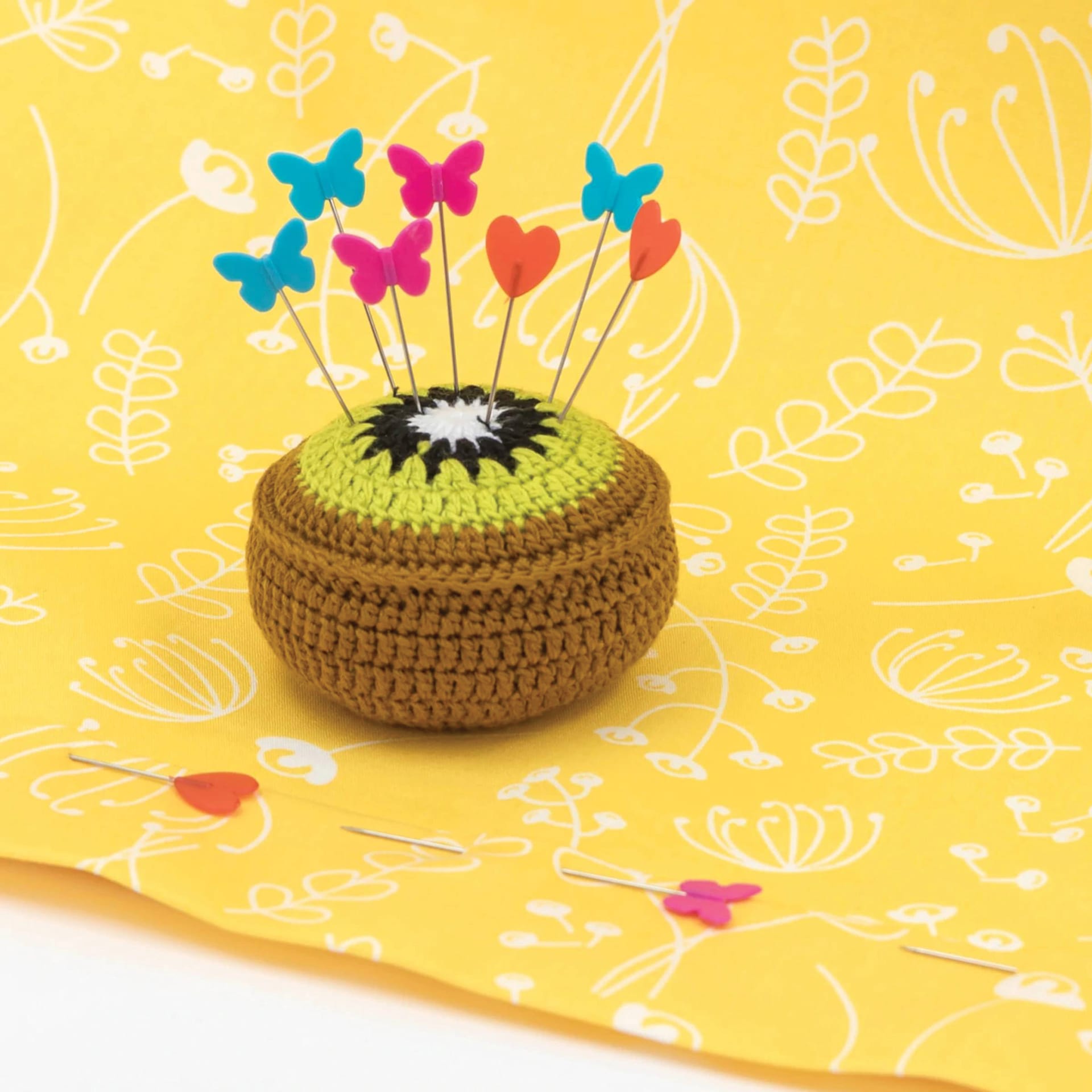 Prym Love Fruit Pin Cushion Pattern Weight - Kiwi 0.8 oz (Cushion with pins stuck into it)