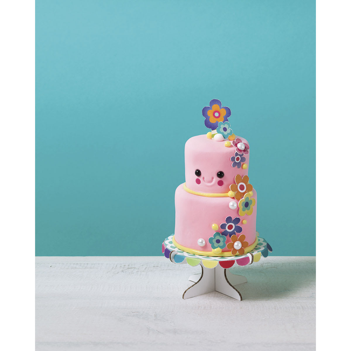 Klutz Mini Bake Shop - Finished example of decorated sculpted Two Tier Pink Cake on Cardboard Stand